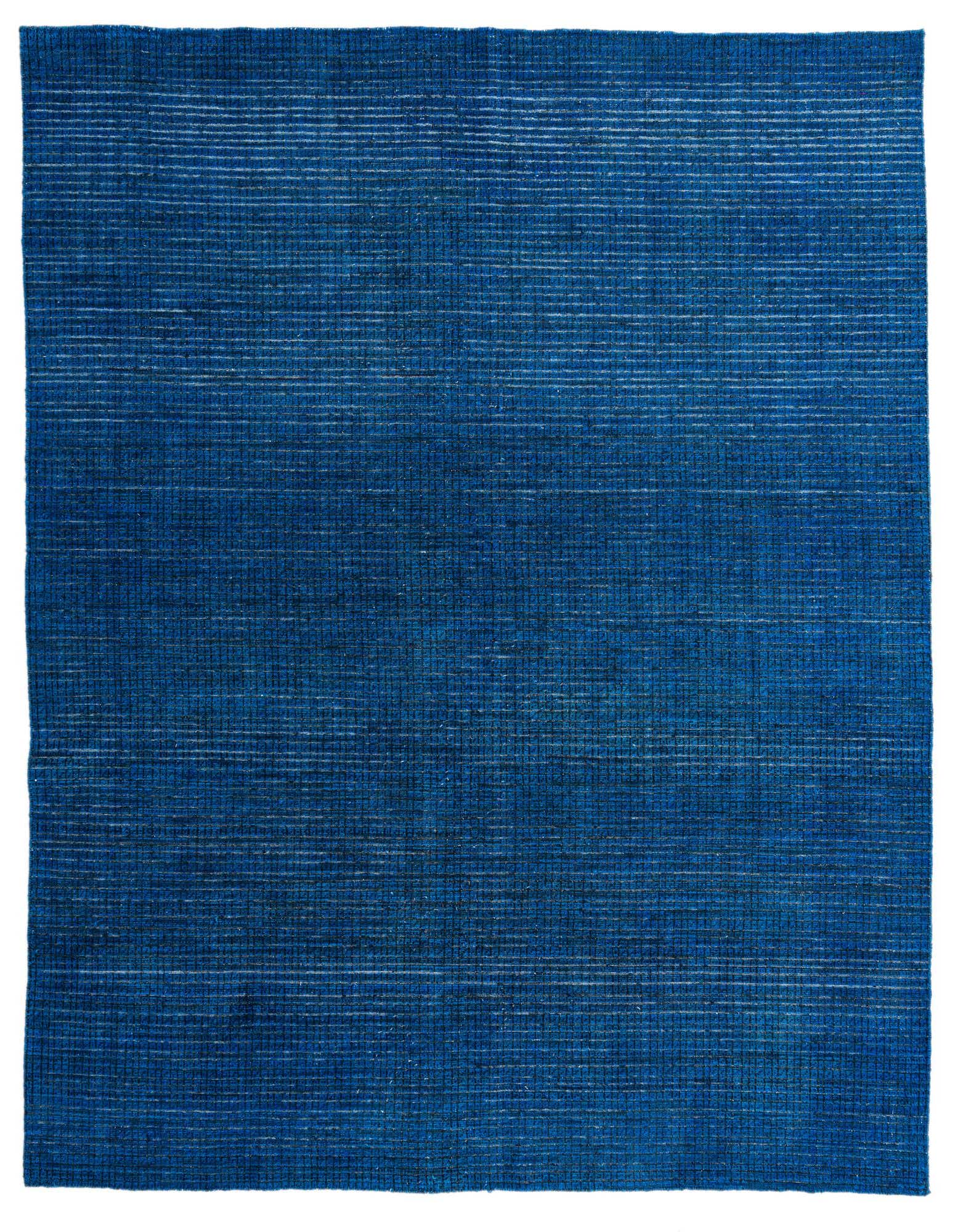 A rectangular 8x10 Darya Collection rug in deep blue wool with subtle horizontal white stripes and a high pile, suitable for a living room.