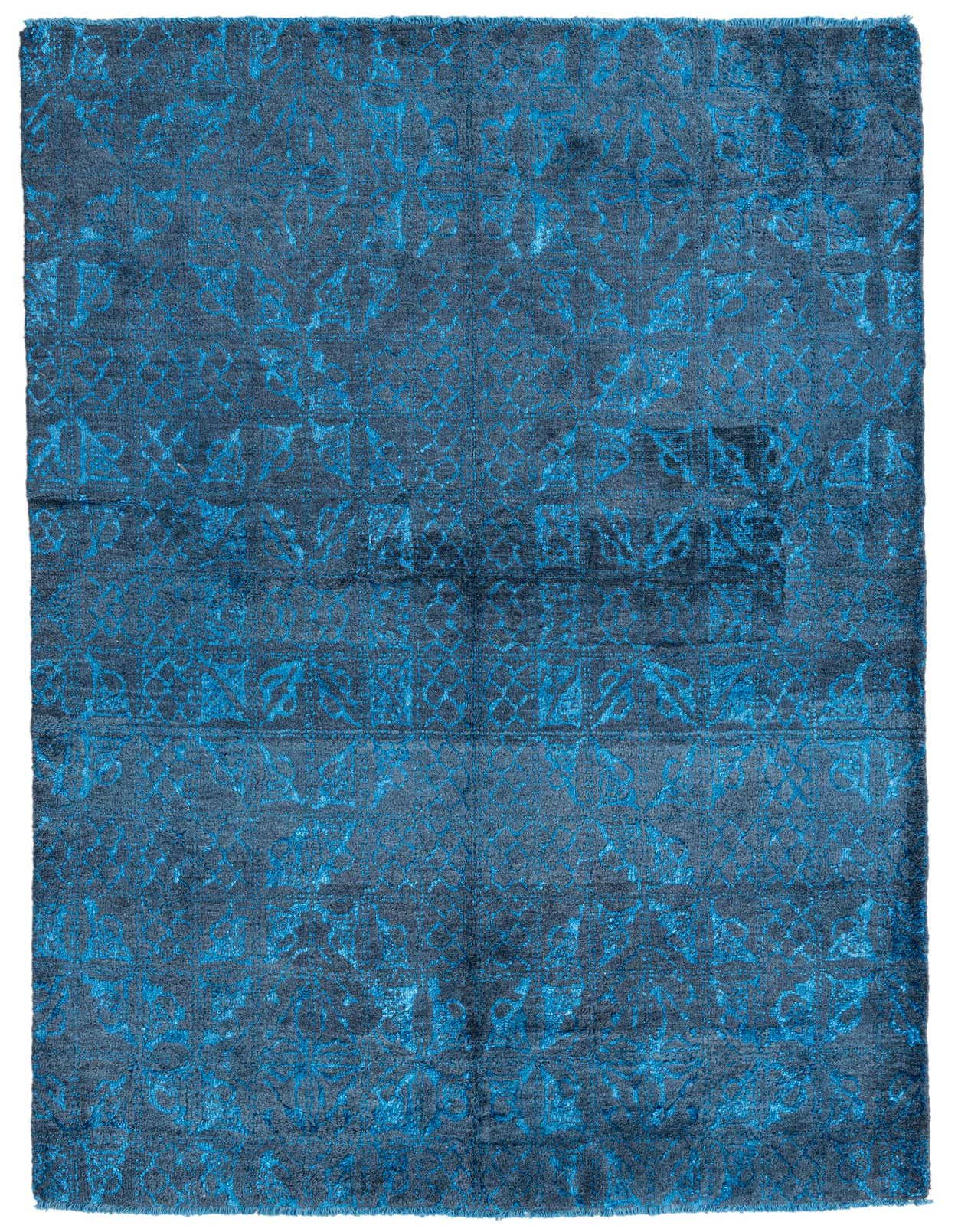 A 6x9 rectangular Darya rug in varying shades of blue, featuring a modern abstract pattern and high pile.