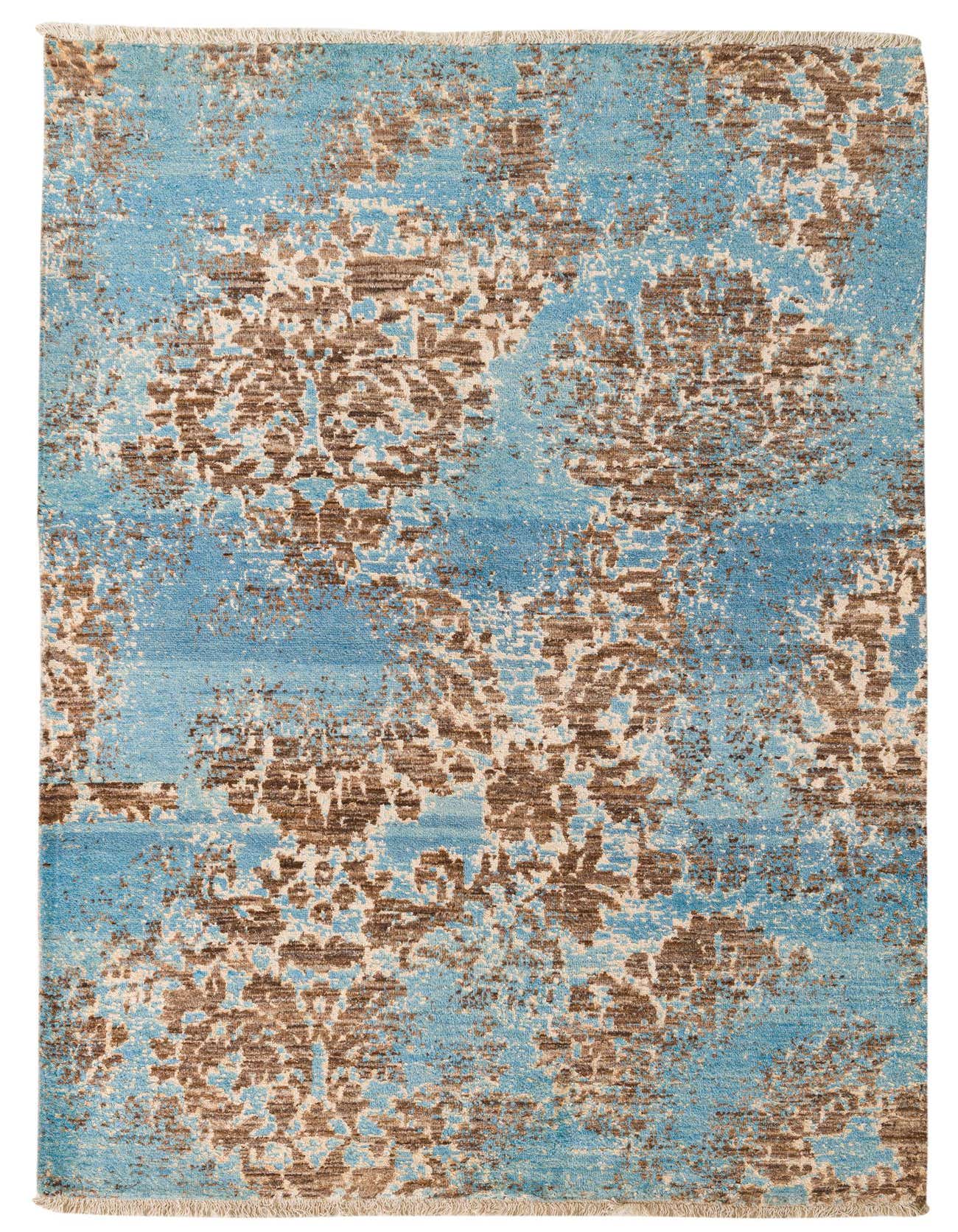 A 6x9 rectangular Darya rug with an abstract modern pattern in varying shades of blue and brown, featuring a high pile.