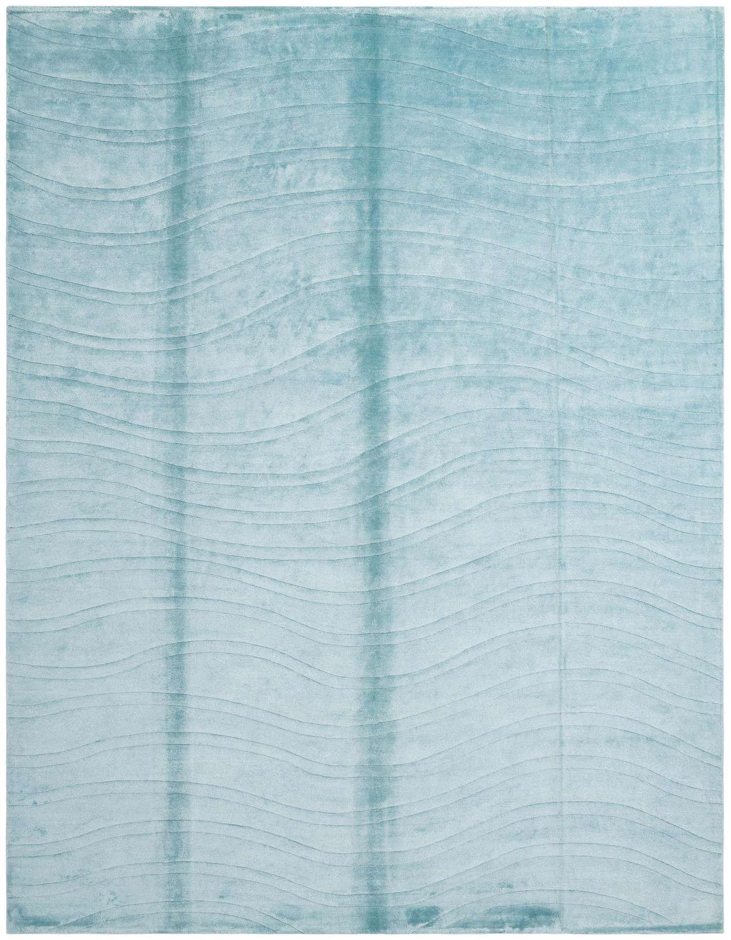 A 10x13 rectangular blue wool area rug with a modern wavy pattern, suitable for a living room.