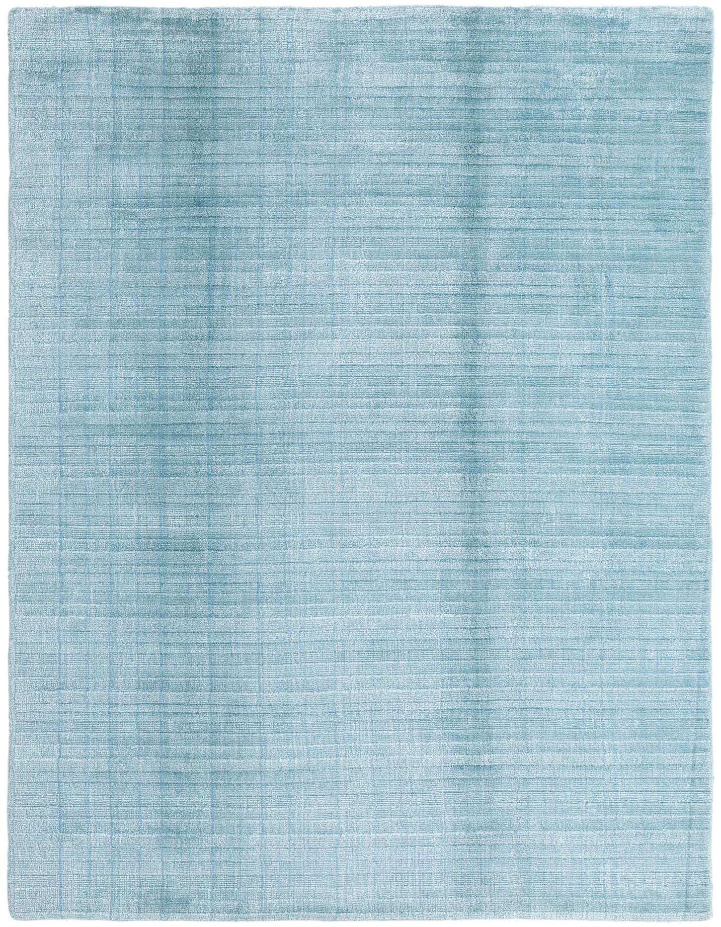 A 5x8 rectangular Darya rug in a soft blue hue, featuring a subtle modern textured pattern, suitable for a living room.