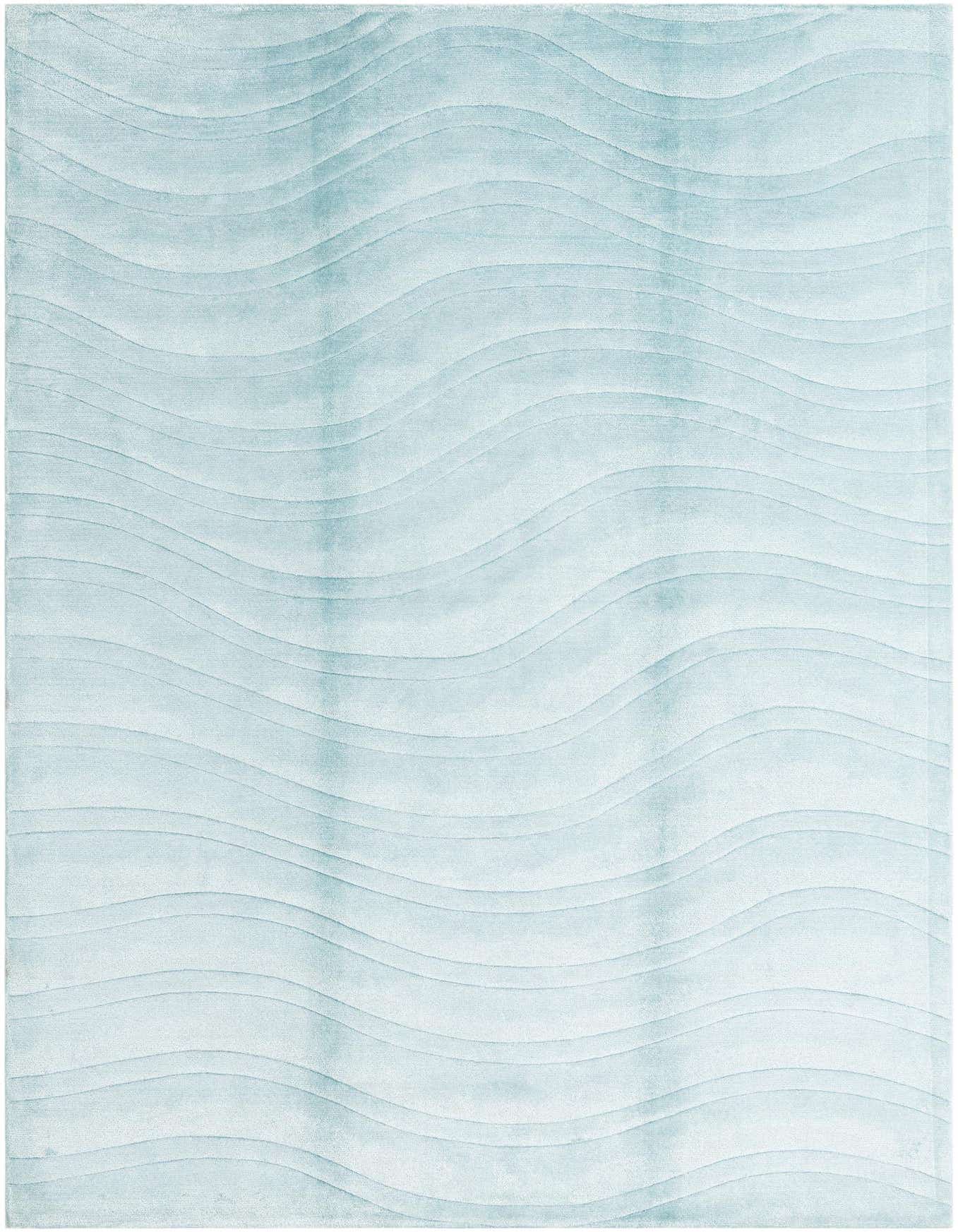 A 7x10 rectangular Darya rug in varying shades of blue, featuring a modern wave pattern with a high pile.