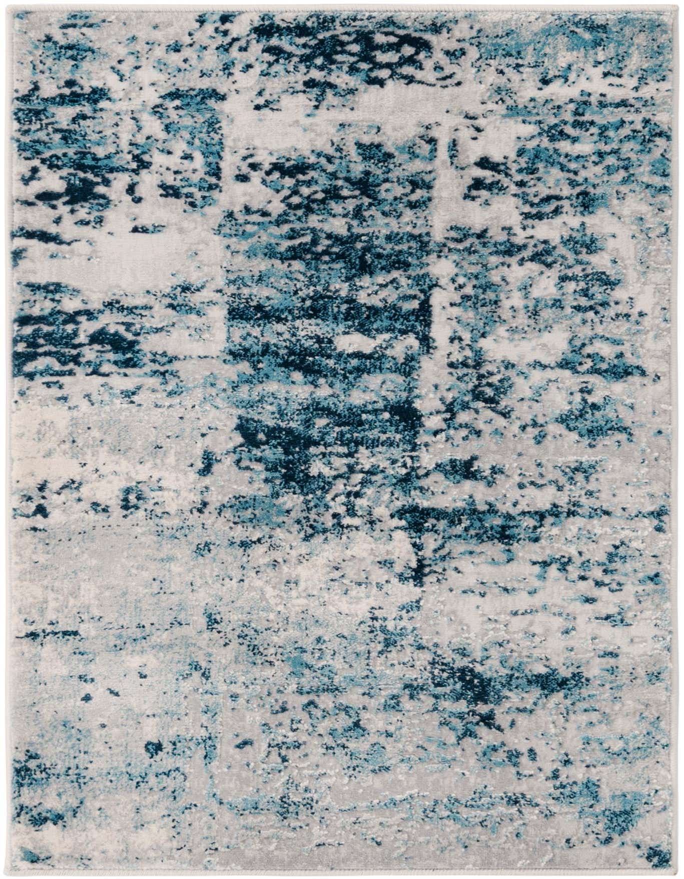 A 2x3 rectangular Finsbury rug featuring an abstract pattern in varying shades of blue and gray, with a textured high/low pile.