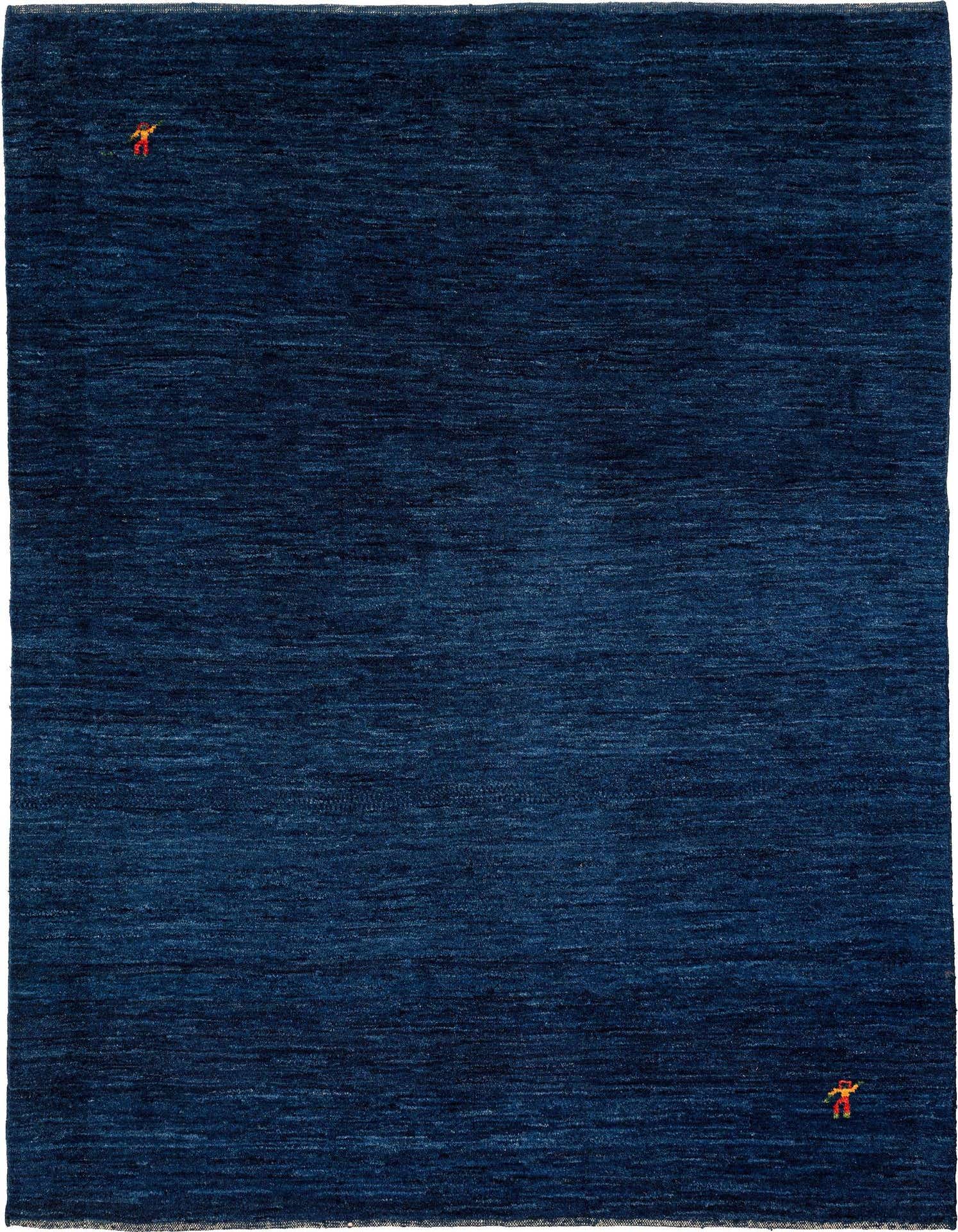 A 5x8 rectangular Gabbeh Shouli rug in deep blue sheep virgin wool with a modern, textured appearance and small, abstract orange figures in two corners.