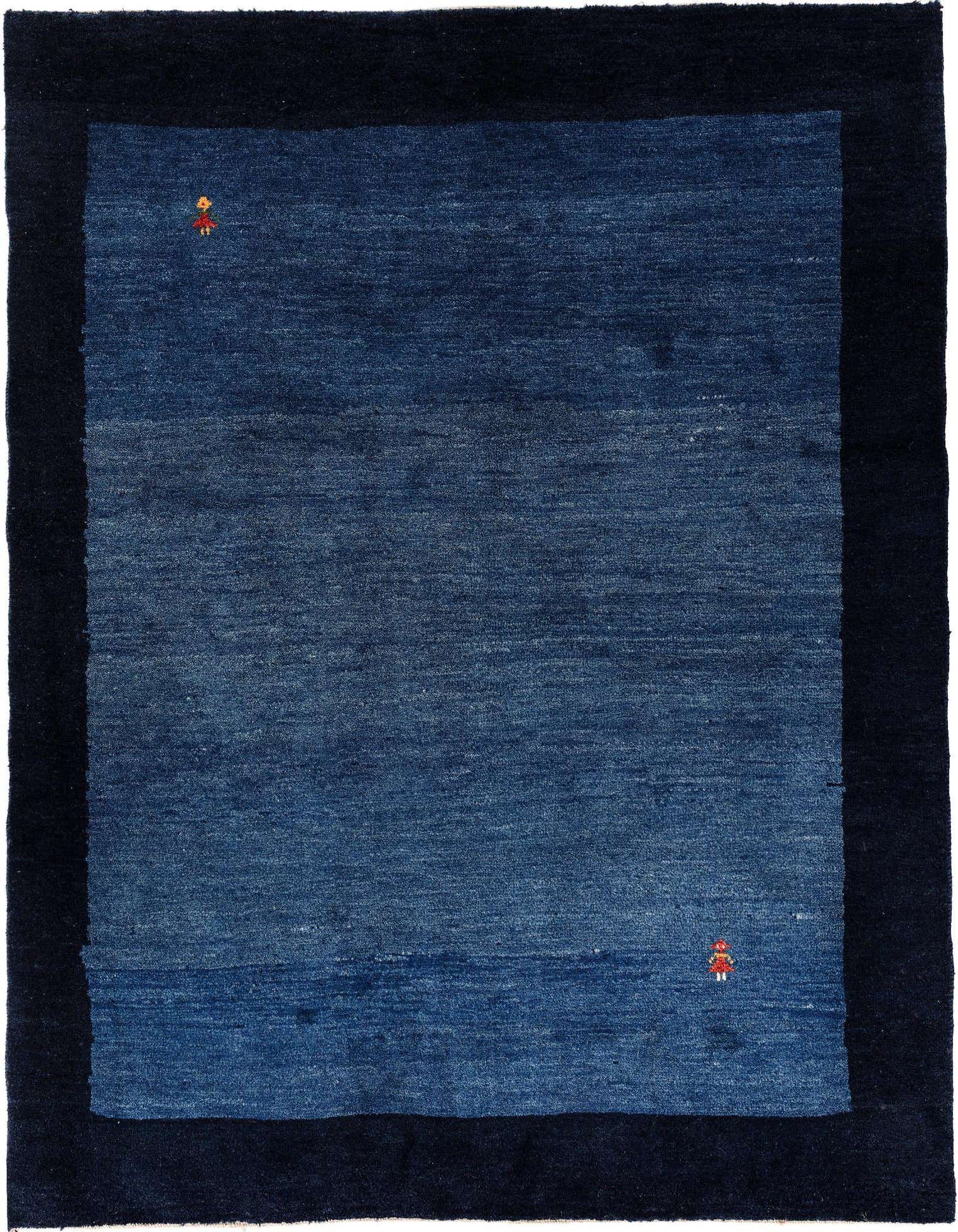 A 4x6 rectangular Gabbeh Shouli rug featuring a deep indigo blue center with a darker navy blue border. Two small, colorful, stylized human figures are visible in the blue field.