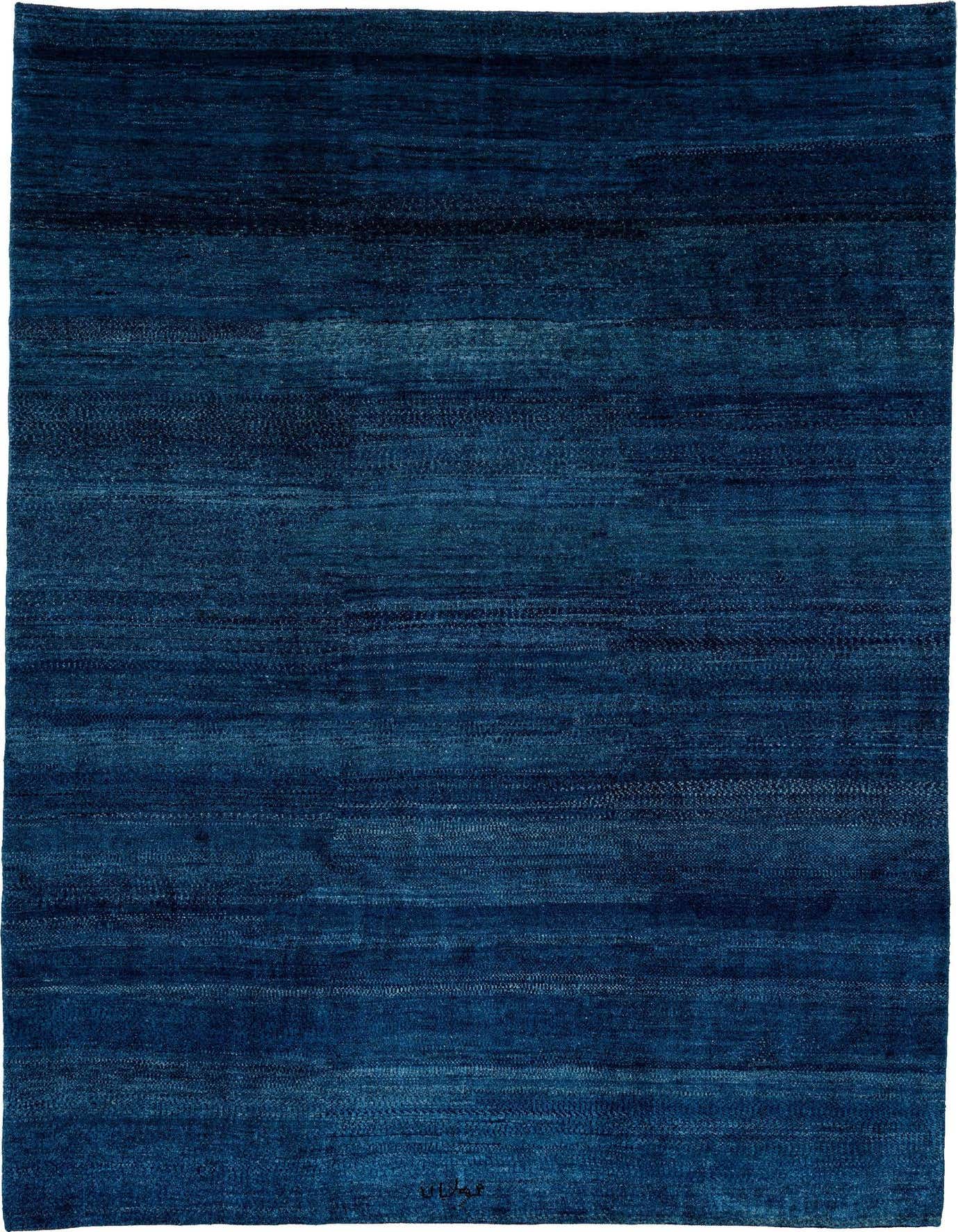 A 6x9 rectangular Gabbeh Shouli rug in varying shades of deep blue, featuring a modern, textured pattern.