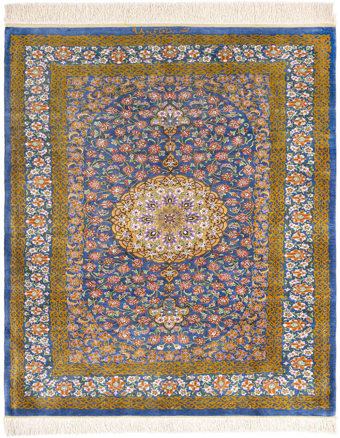 A 3x4 rectangular Ghom Silk Persian rug in shades of blue with an intricate floral medallion pattern and golden borders.