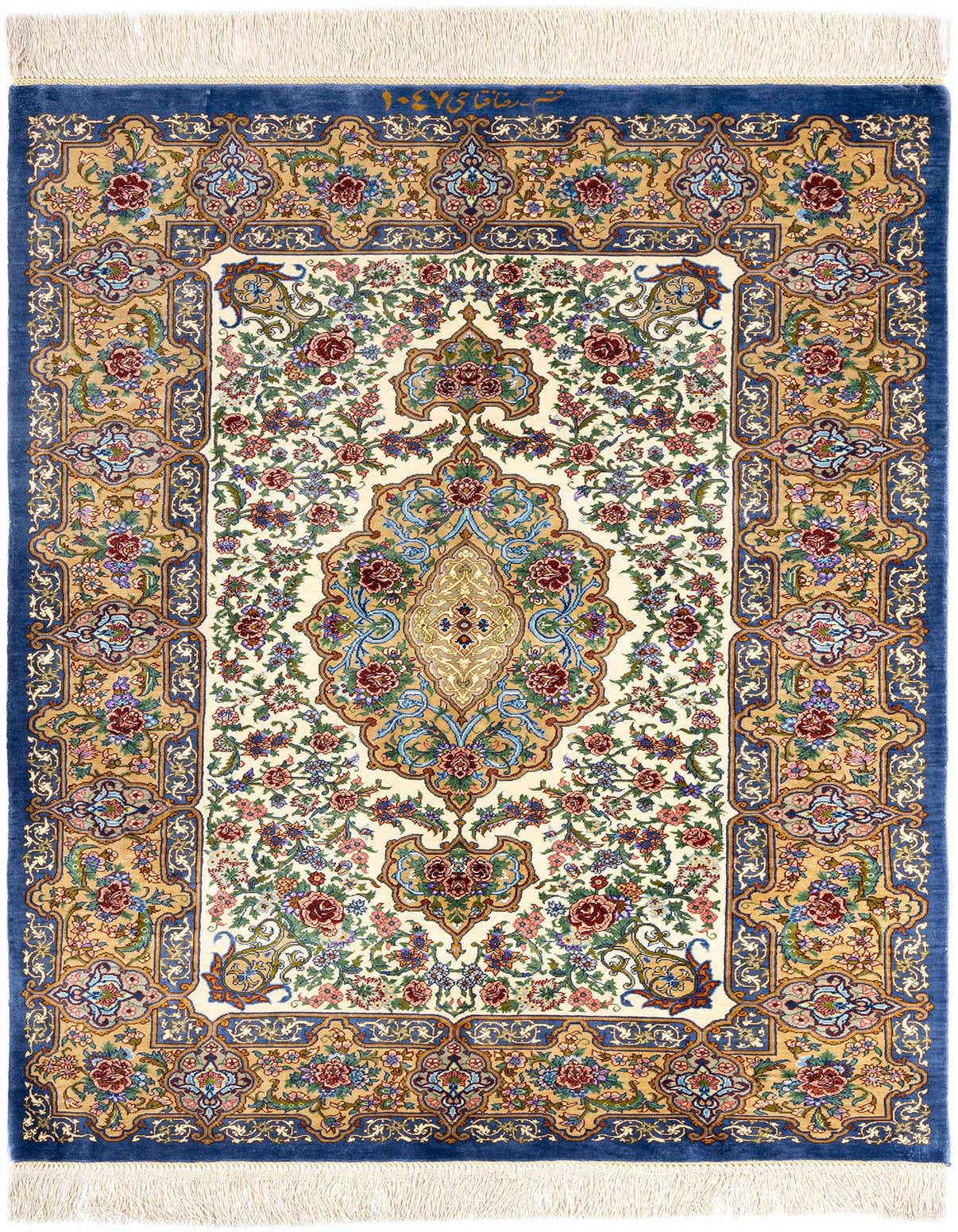 A luxurious 3x4 rectangular Ghom Silk Persian rug featuring a detailed floral medallion on a cream field with a rich blue border.