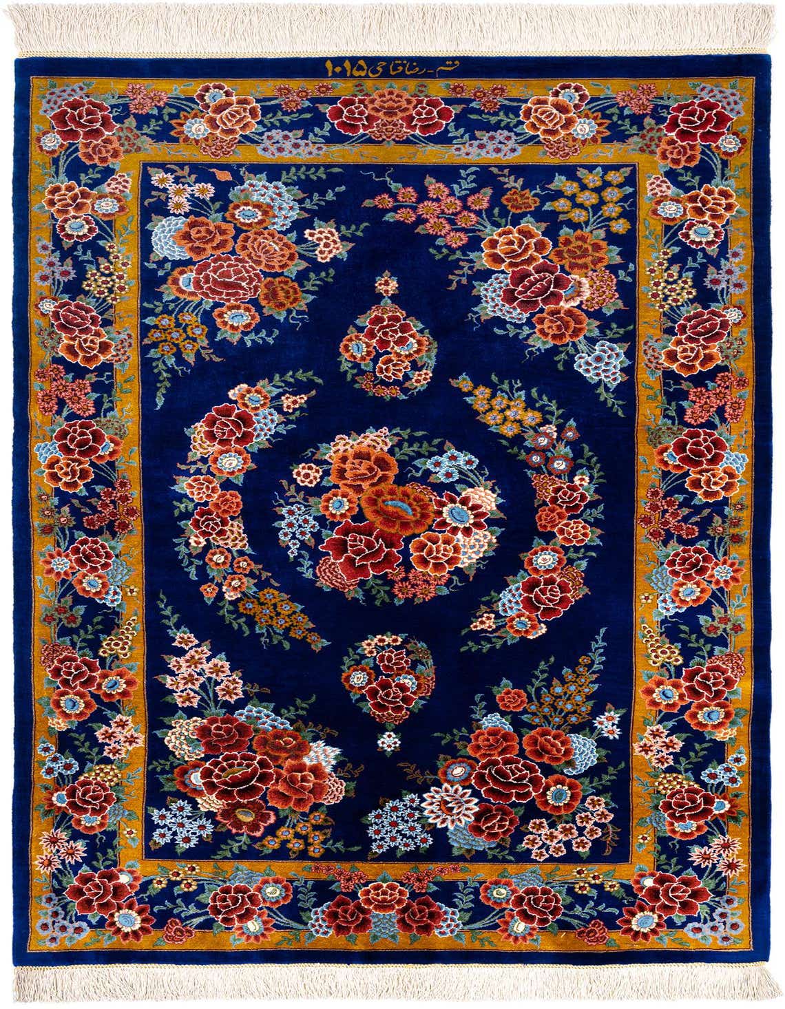 A luxurious 3x4 rectangular Ghom Silk Persian rug in deep blue with intricate floral patterns and a gold border.
