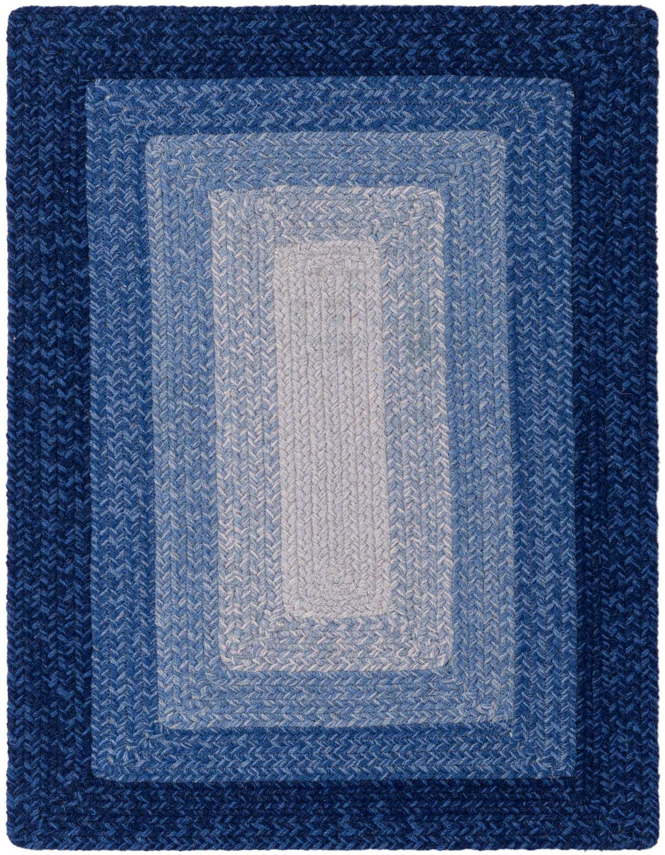 A 2x3 rectangular hand-braided wool rug featuring a modern stripe pattern with varying shades of blue, from dark navy to light blue, ideal for an entryway or kitchen.