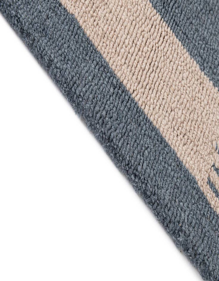 Detail image of  5' 1 x 8' 1 Hand Tufted Wool Rug