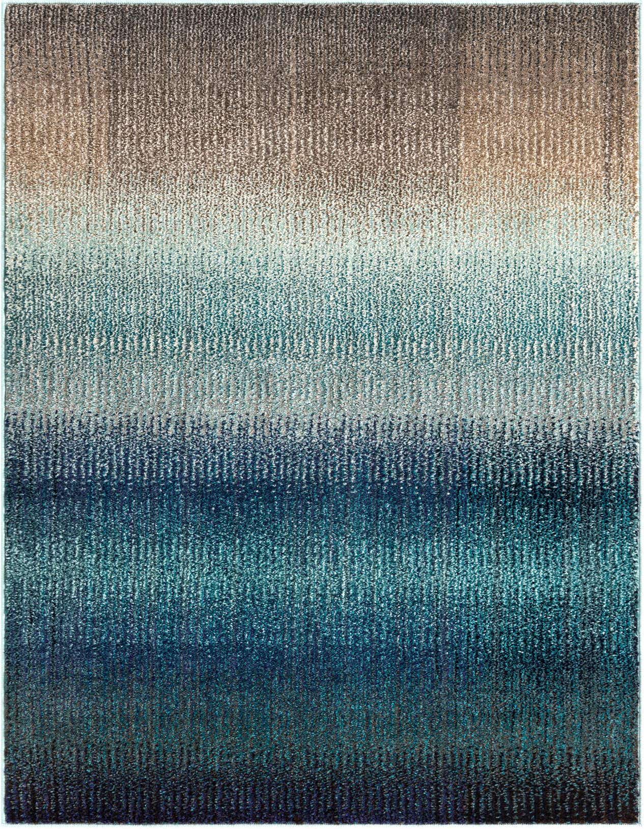 A 3x5 rectangular Hyacinth rug featuring a modern abstract design with an ombre blend of blues and hints of brown.