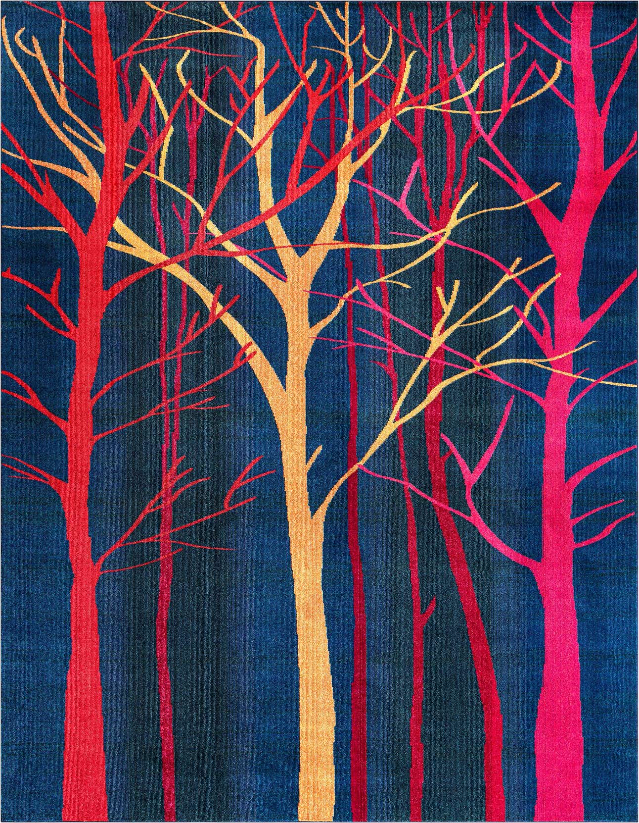 A rectangular blue area rug featuring a vibrant, modern botanical pattern of red, orange, and pink bare trees.