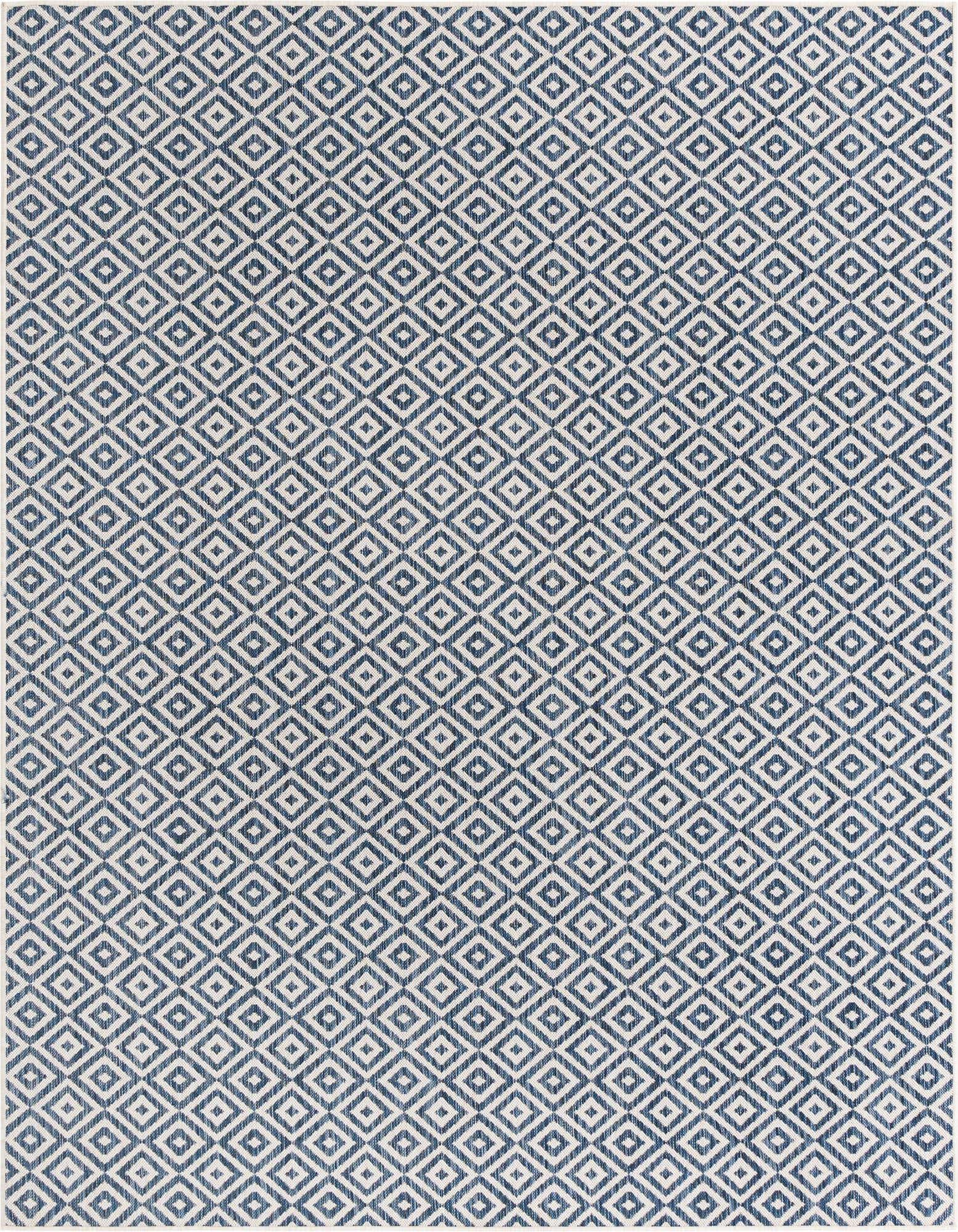 An 8x10 rectangular blue and white indoor/outdoor rug with a modern bohemian trellis pattern.