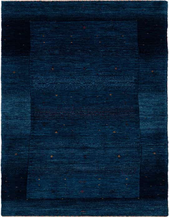 A handmade rectangular Kashkuli Persian rug in varying shades of deep blue with subtle, scattered accent patterns.
