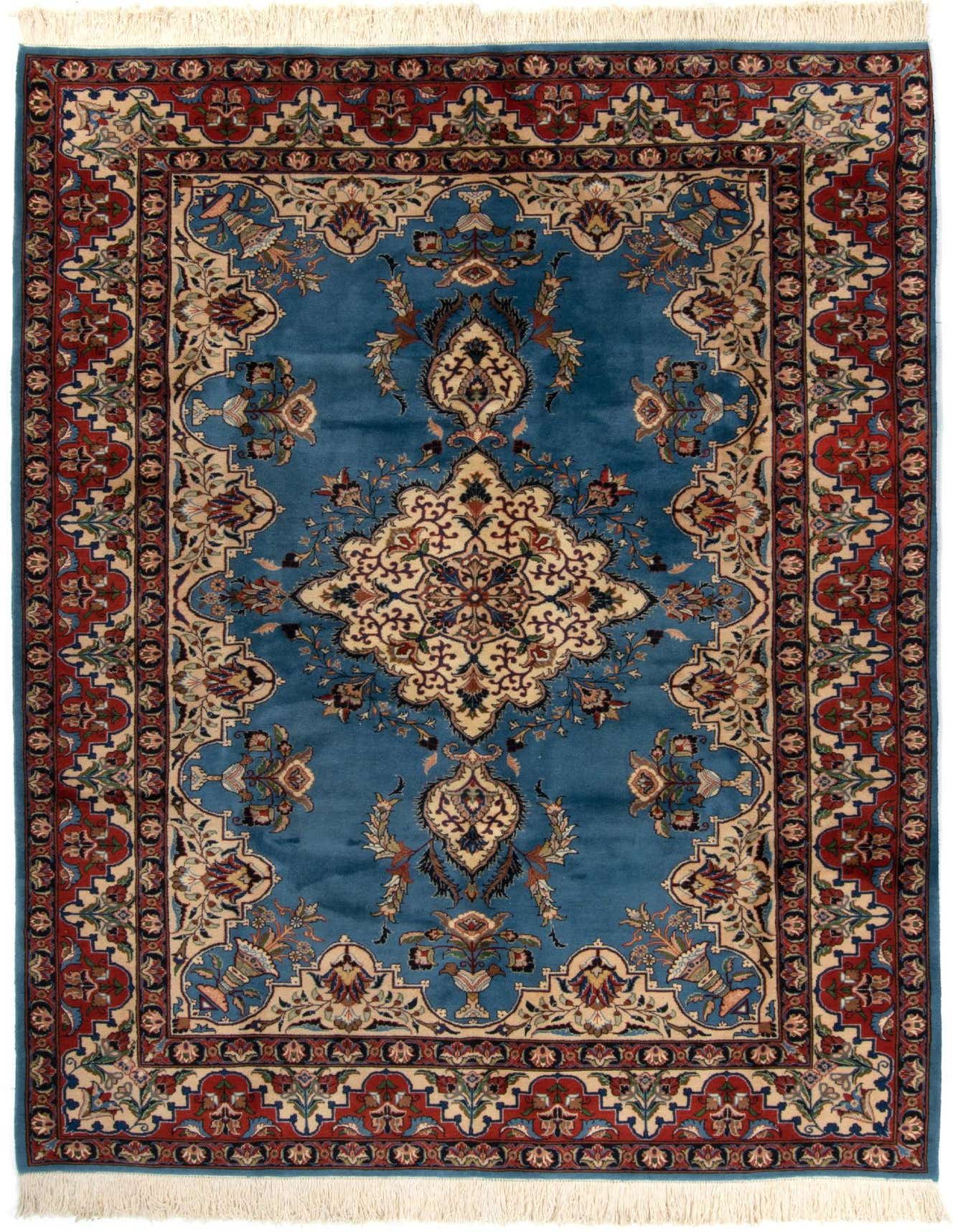 A 6x9 rectangular blue Persian rug with an intricate central medallion and floral motifs, bordered by red and cream patterns.