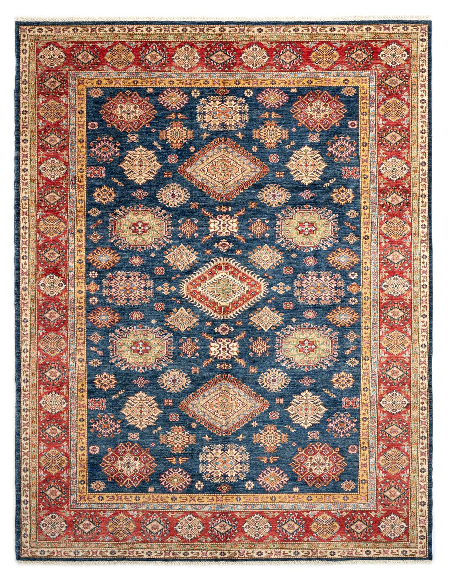 A 9x12 rectangular Rugs.com Kazak Persian rug with a deep blue field and intricate red, gold, and multi-colored traditional patterns.