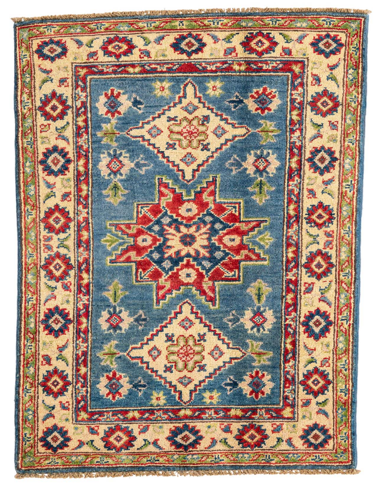 A 3x4 rectangular blue hand-spun wool rug with a traditional Southwestern medallion pattern in red, cream, and green.