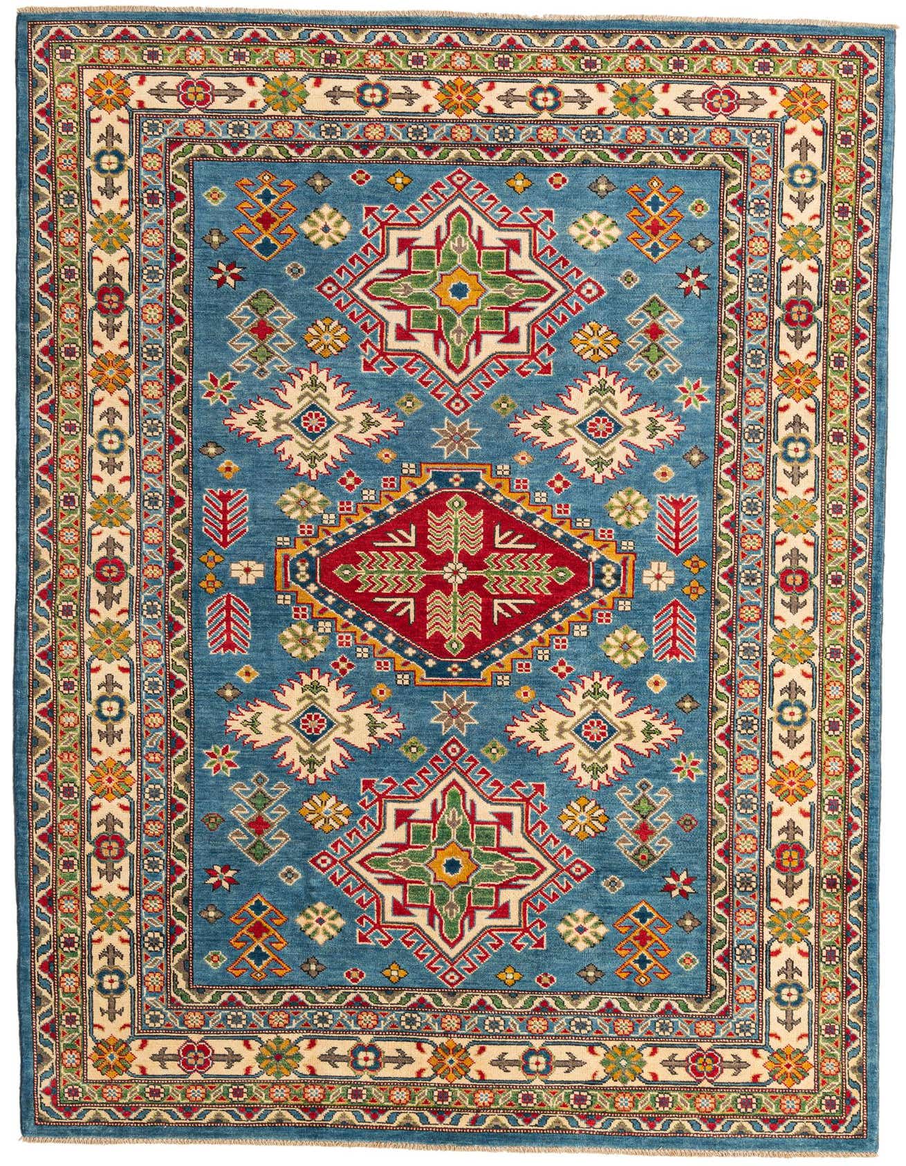 A 6x9 rectangular Rugs.com Kazak rug with a blue field, red medallion, and intricate Southwestern and Oriental patterns.