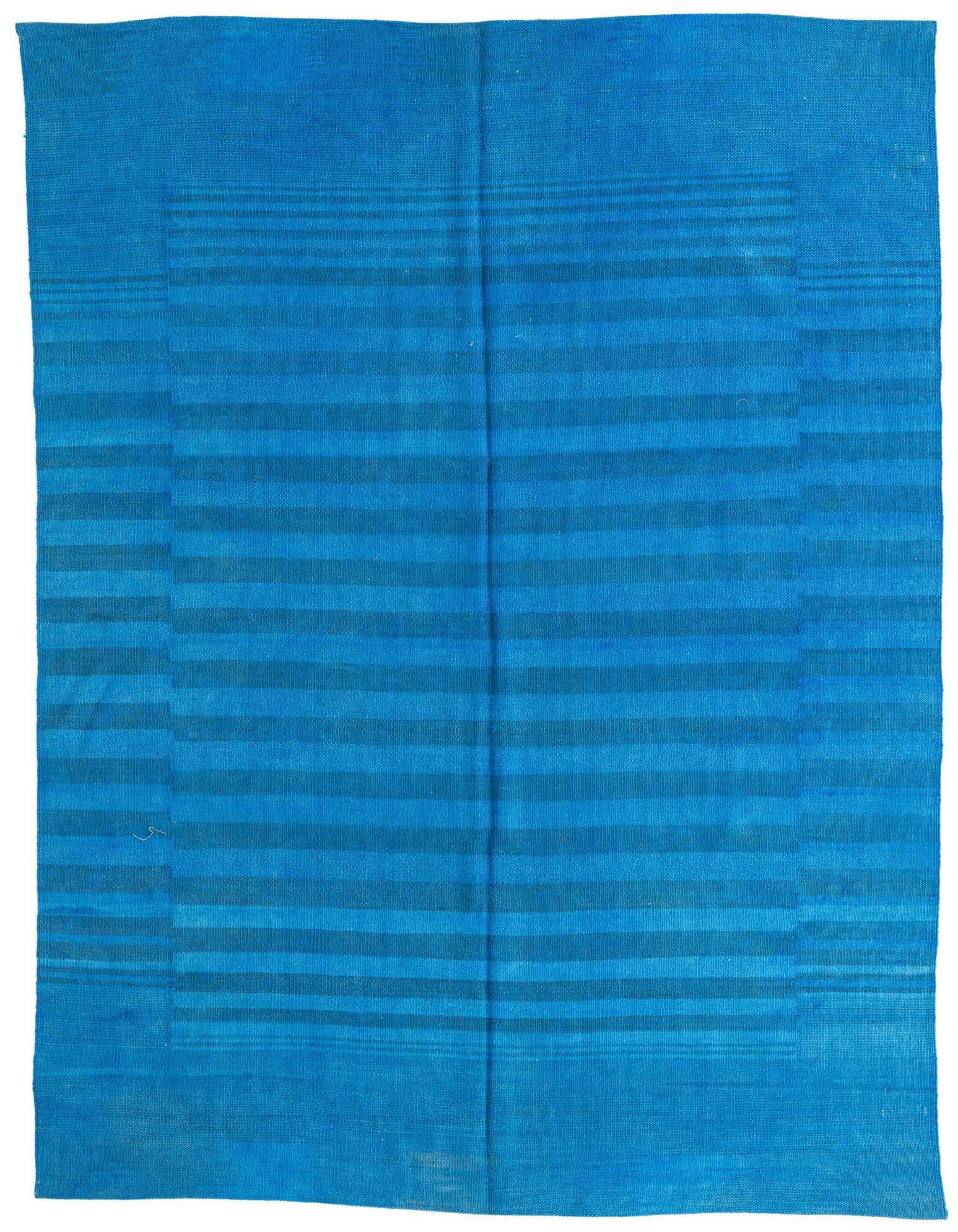A 5x8 rectangular Kilim Modern rug in shades of blue, featuring a flatweave texture and subtle horizontal stripes.