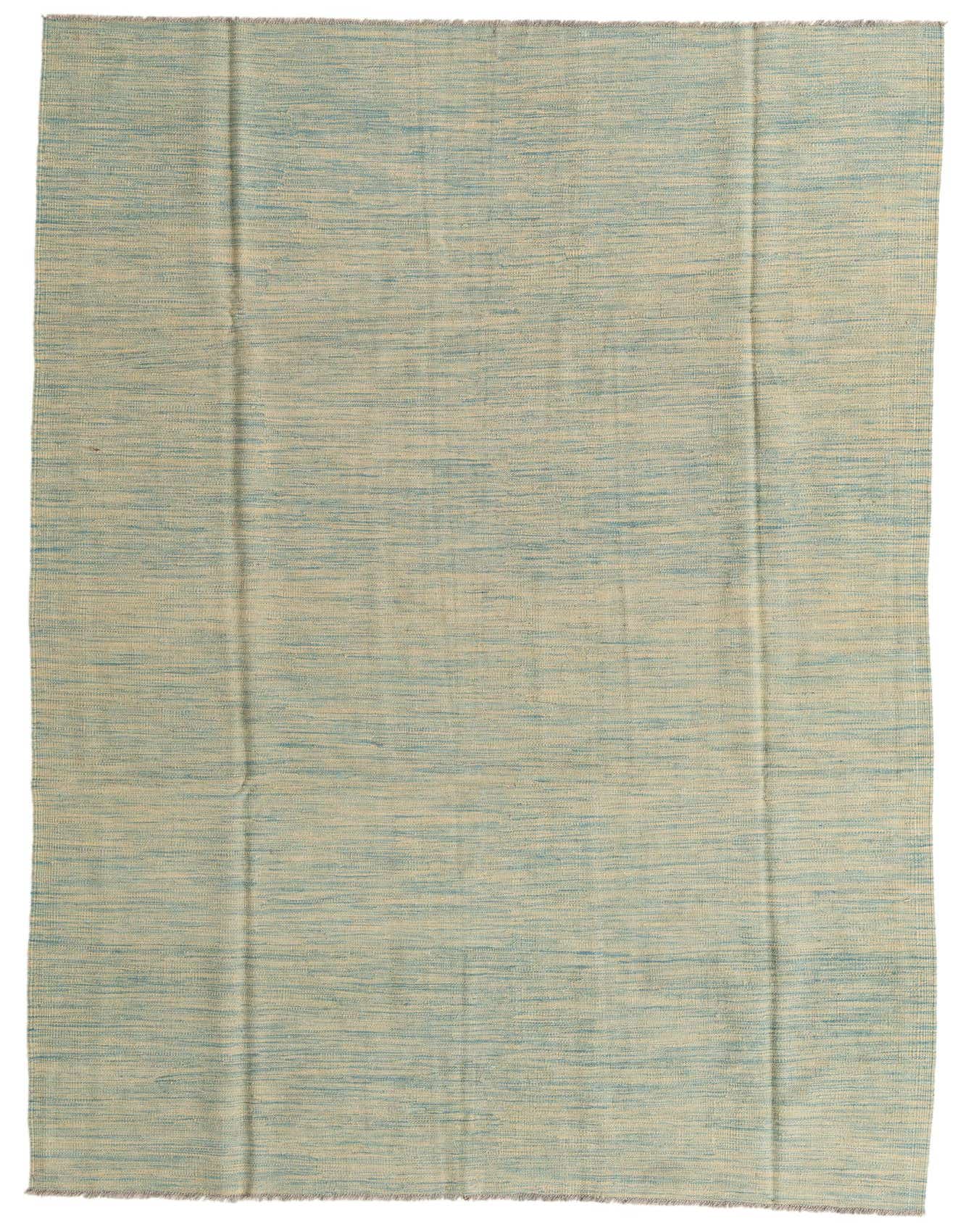 A 7x10 rectangular flatweave rug in varying shades of blue, showcasing a modern tribal pattern.