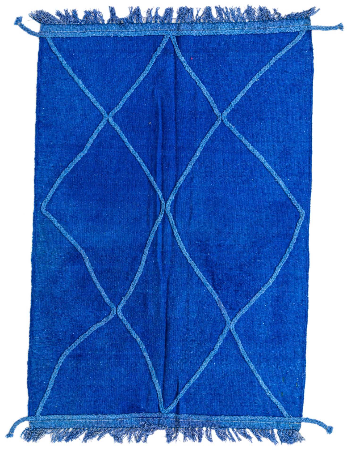 A 3x5 rectangular blue wool rug with a flatweave, featuring a raised diamond lattice pattern and fringed ends.