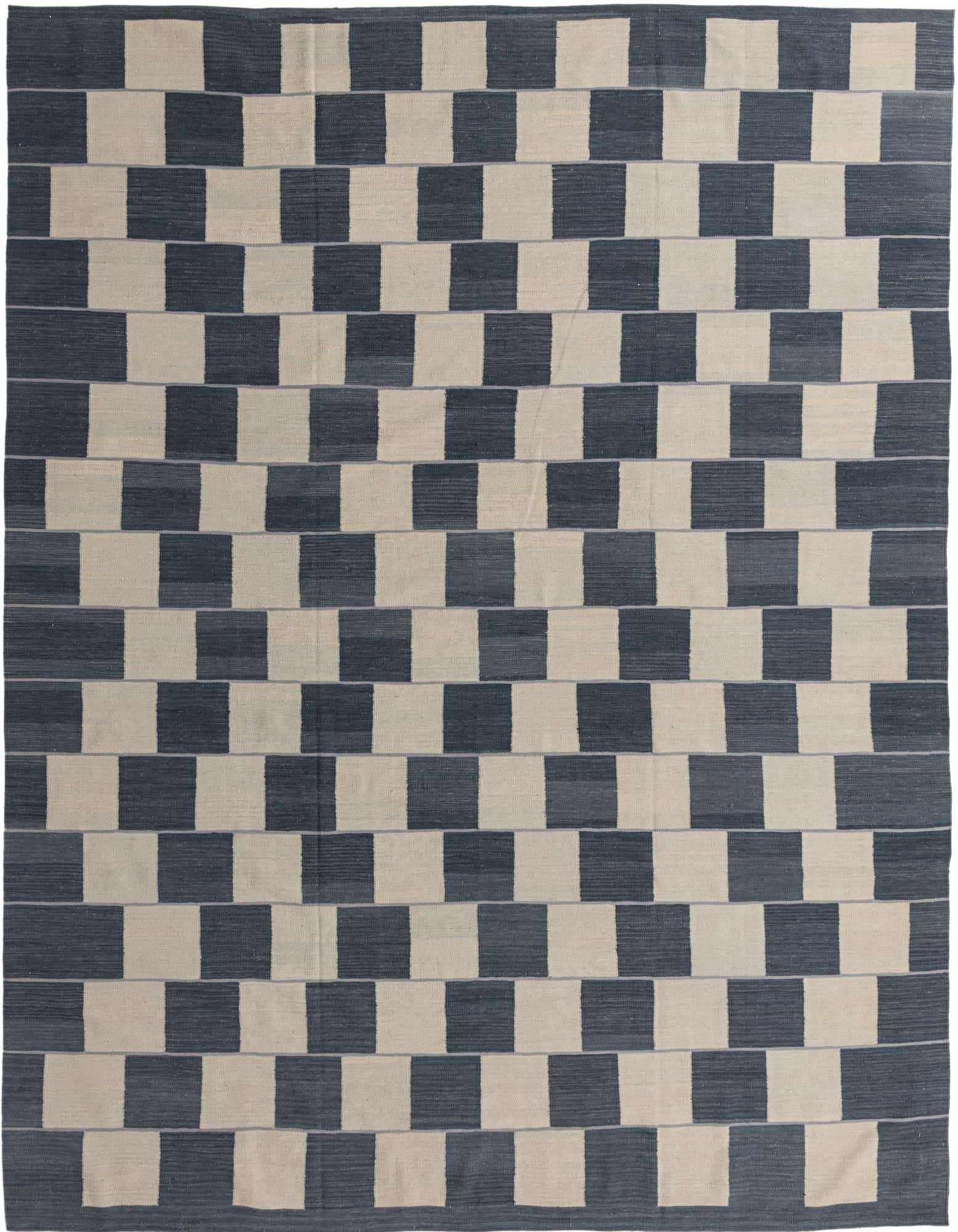 A 10x13 rectangular Kilim Modern wool rug featuring a repeating pattern of alternating dark blue and light cream blocks.
