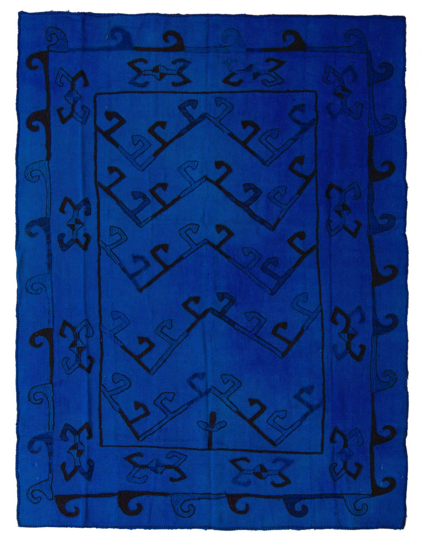 A 4x6 rectangular blue Kilim Suzani rug with a tribal, abstract pattern in darker blue, suitable for a living room.
