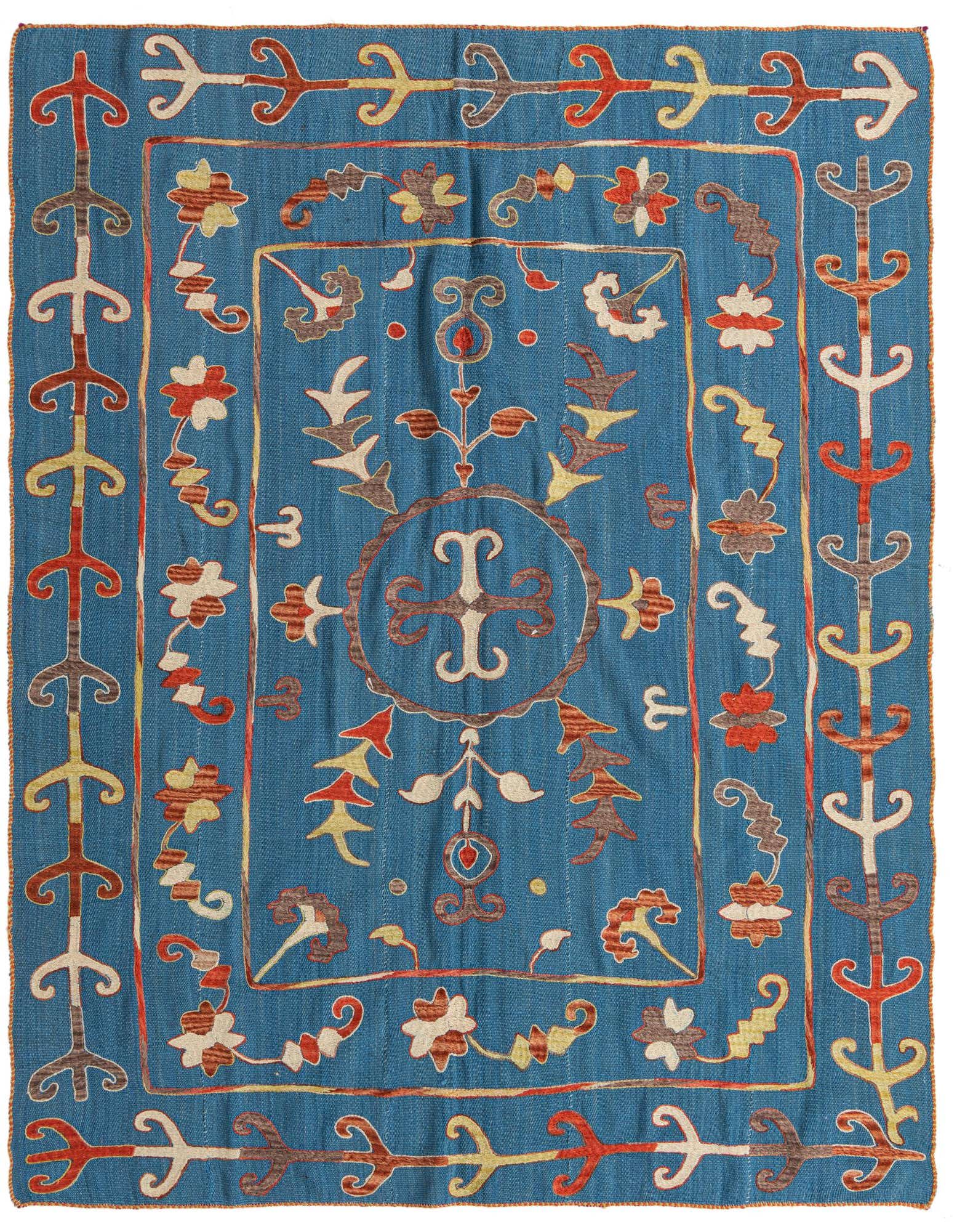 A 5x8 rectangular blue Kilim Suzani rug with a tribal, oriental pattern in red, yellow, and brown.