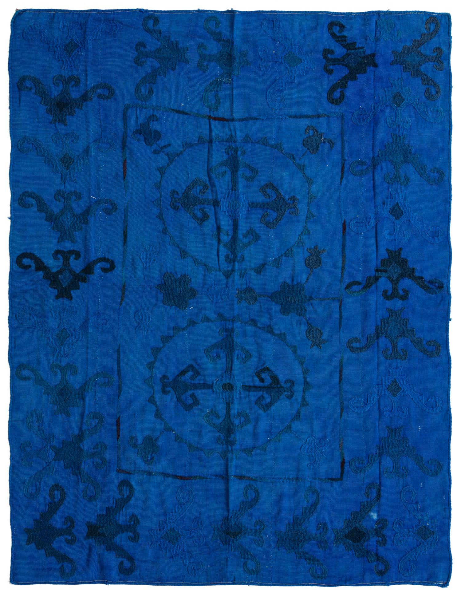 A 4x6 rectangular blue Kilim Suzani rug with dark blue tribal and floral patterns, handmade from wool.