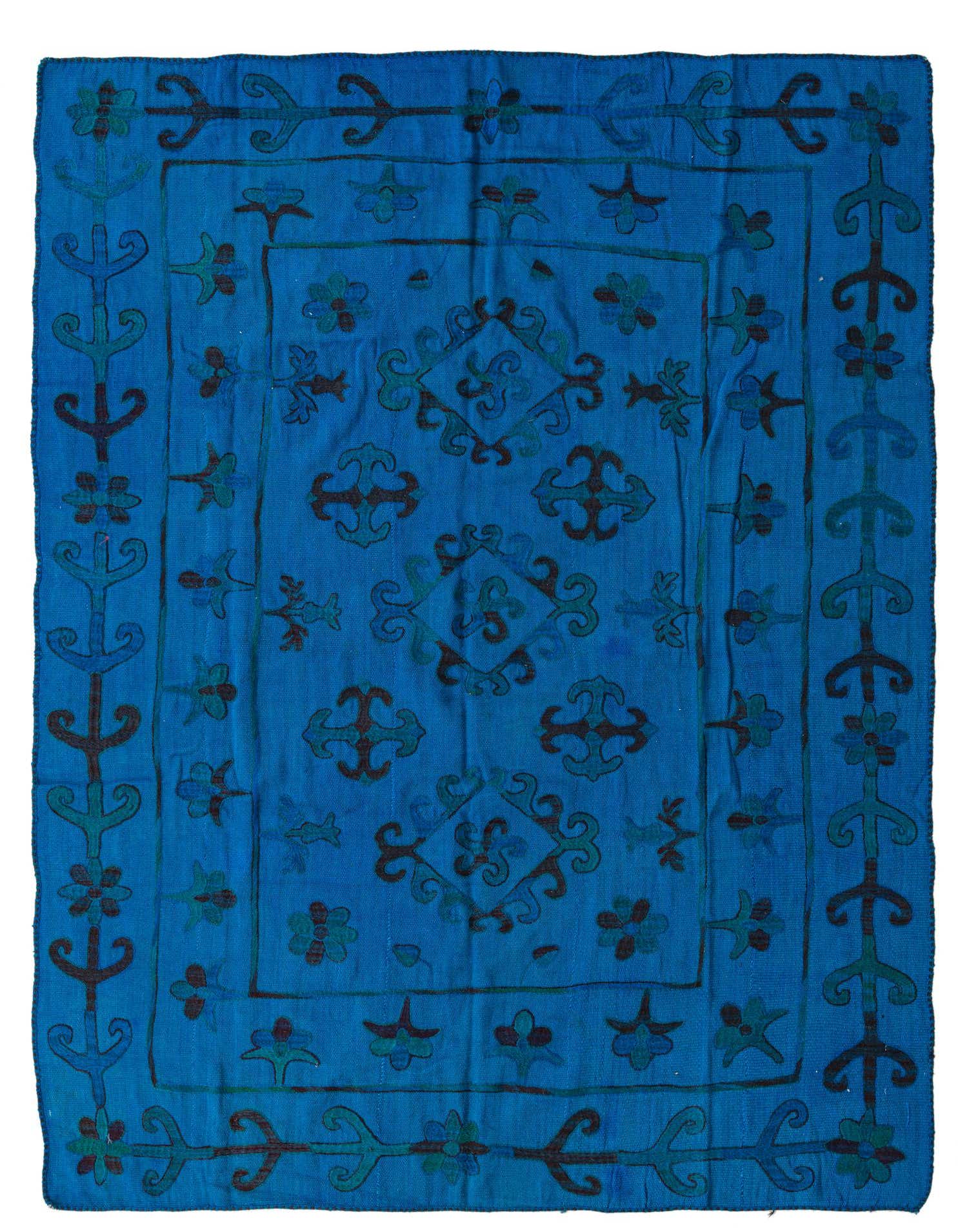 A 5x8 rectangular blue Kilim Suzani rug with a flatweave texture. It features a tribal and oriental pattern in varying shades of blue and darker accents, ideal for a living room or entryway.