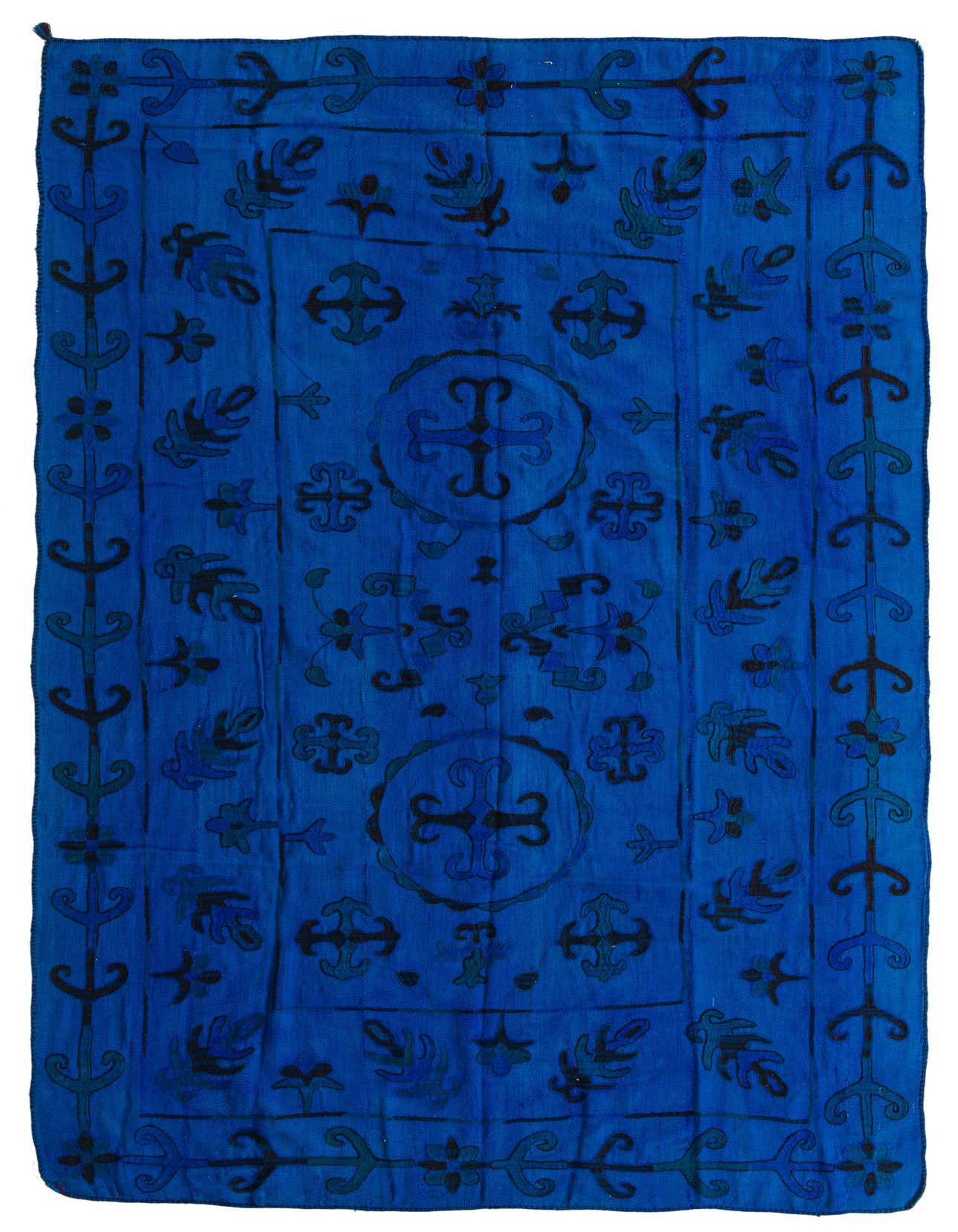 A 6x9 rectangular blue flatweave rug with a dark blue tribal and oriental pattern, suitable for a living room.