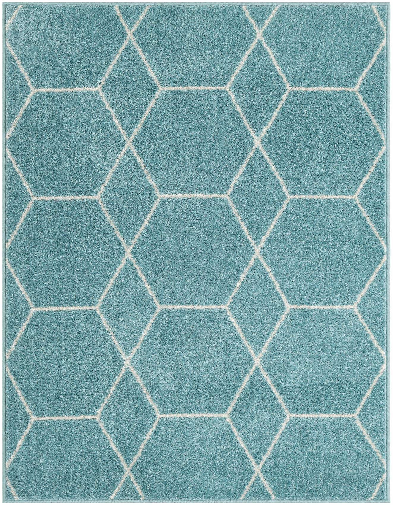 A 3x5 rectangular blue modern rug with a thin pile and a white geometric lattice pattern.