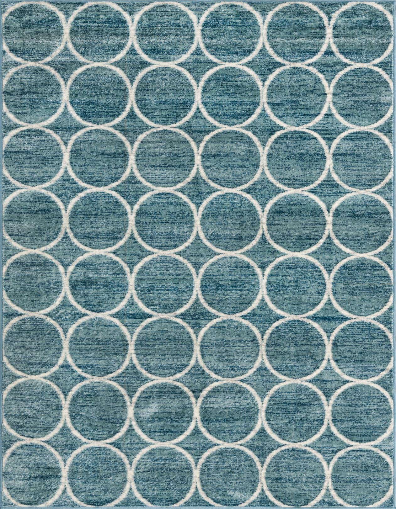 A 5x8 rectangular blue area rug with a repeating white trellis circle pattern, ideal for a living room.