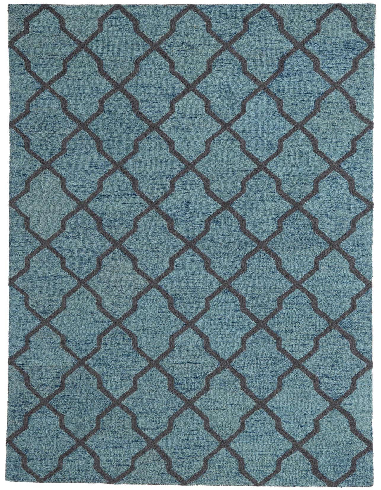 A 5x8 rectangular blue wool and cotton rug with a high pile and a modern abstract pattern of interlocking gray quatrefoil shapes.