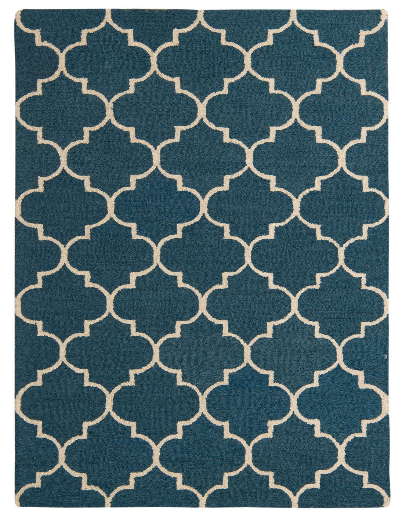 A 5x8 rectangular Luna Collection rug featuring a modern abstract pattern in deep blue with a cream trellis design.