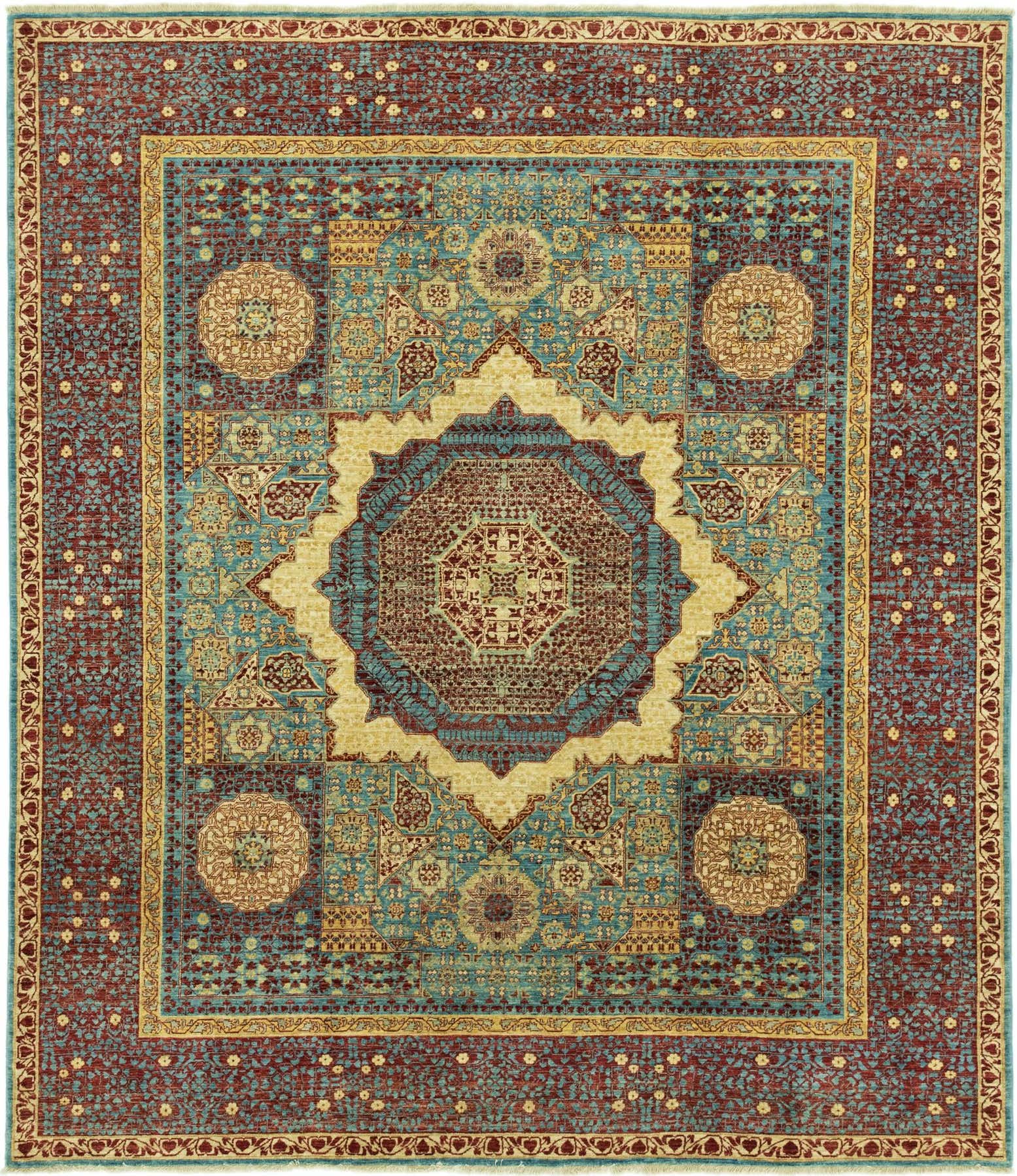 An 8x10 rectangular Mamluk Ziegler rug featuring a central medallion in blues, reds, and gold, with intricate traditional patterns.