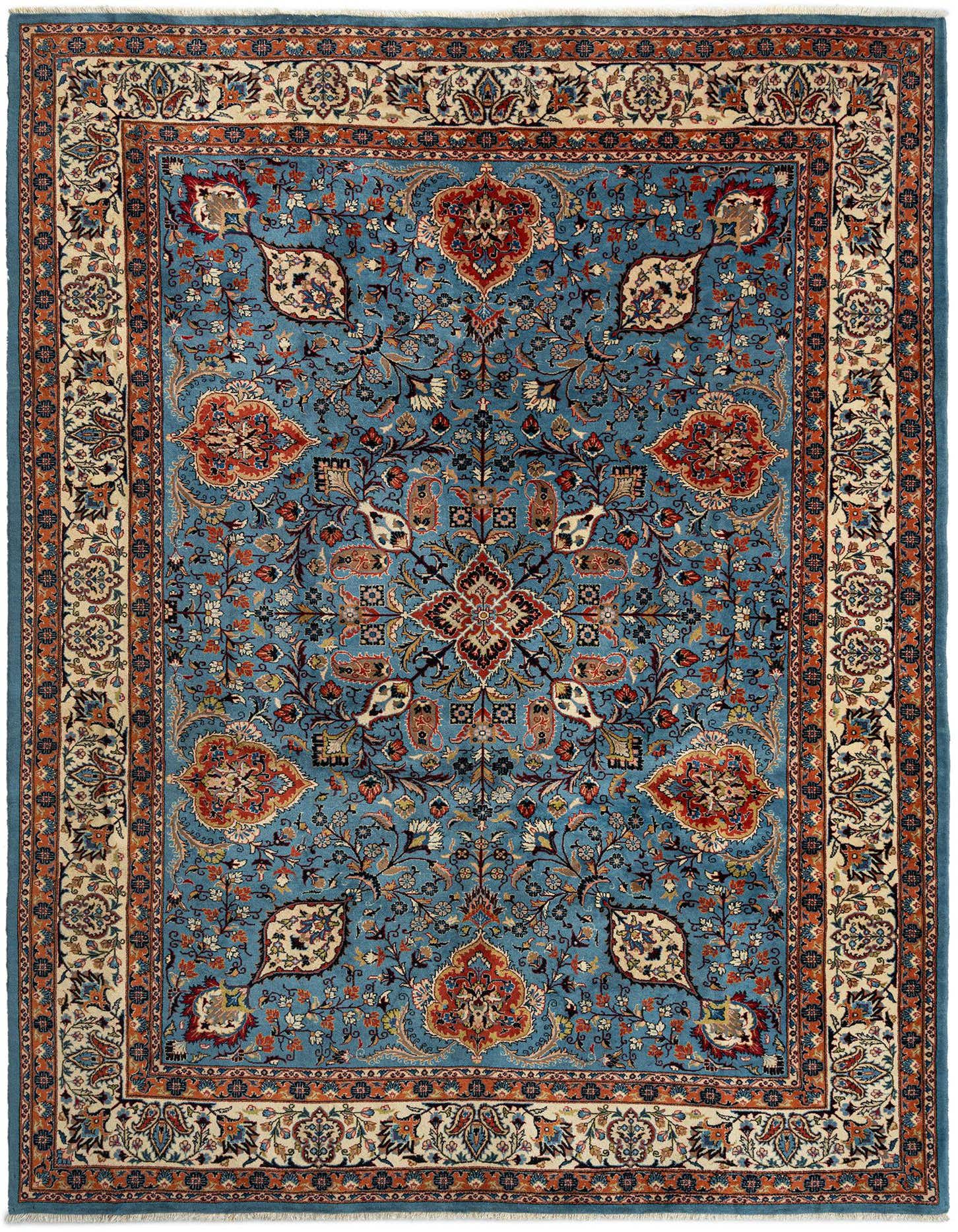An 8x11 rectangular blue Persian rug with intricate floral and medallion patterns in shades of red, orange, and cream, featuring a detailed border.