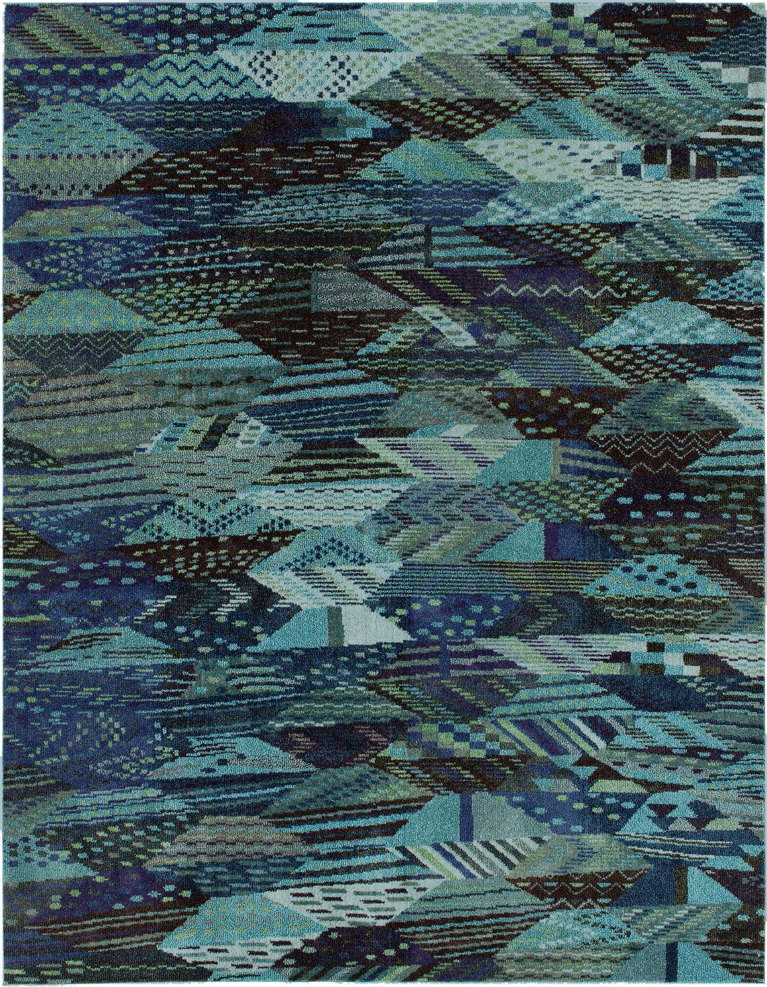 An 8x10 rectangular Rugs.com Mesa rug features an abstract, eclectic pattern in various shades of blue, teal, and hints of green and brown.