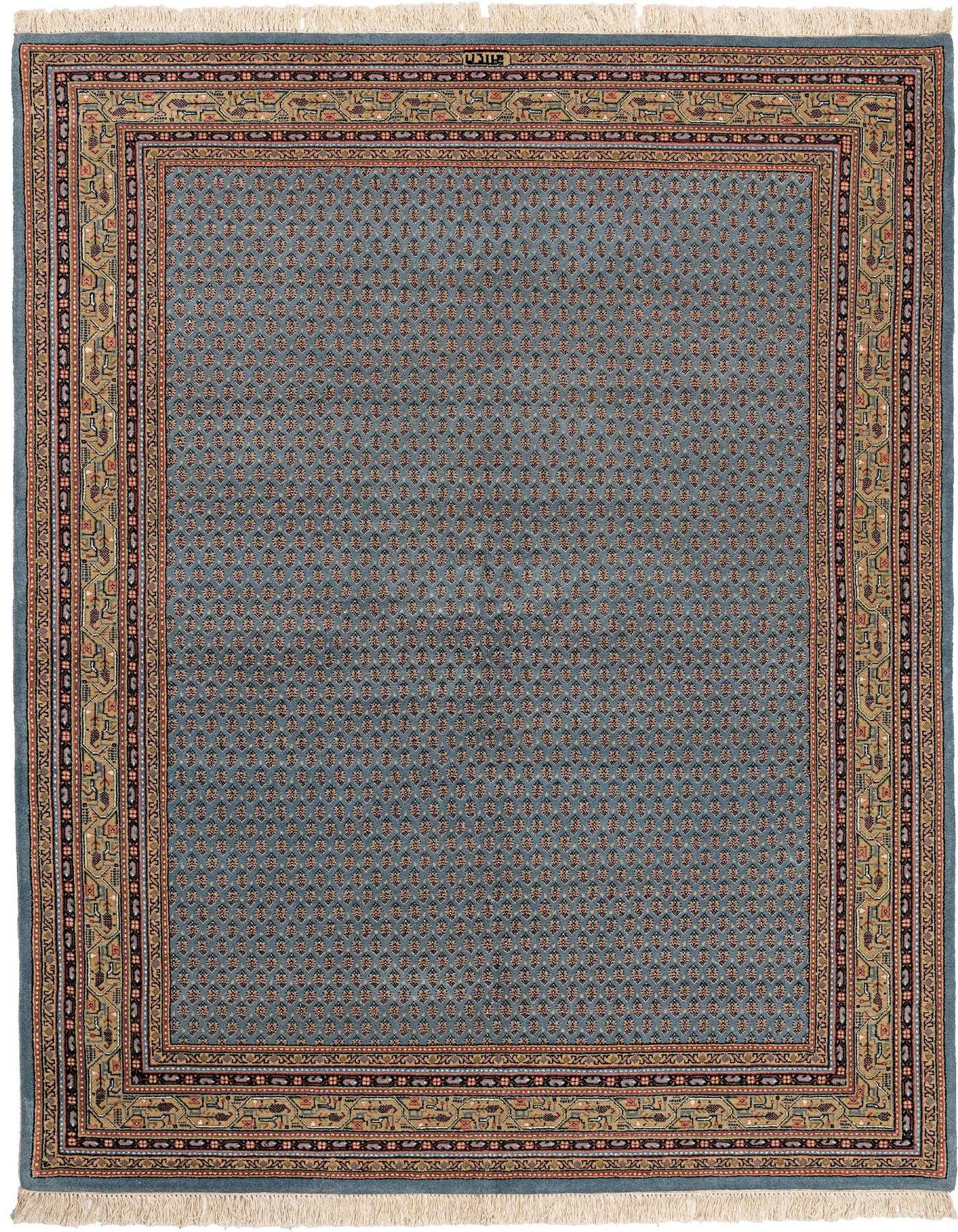 A 5x8 rectangular blue wool rug with a detailed traditional border and small repeating patterns.