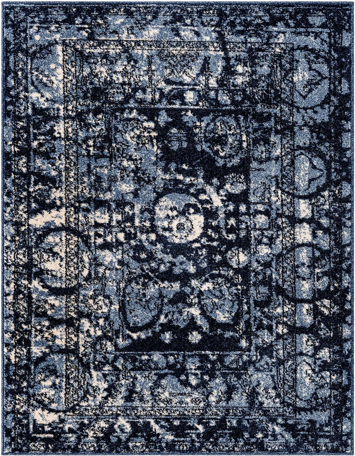 A 3x5 rectangular Miranda rug from Rugs.com with a distressed blue medallion and botanical pattern, featuring shades of navy, light blue, and cream.
