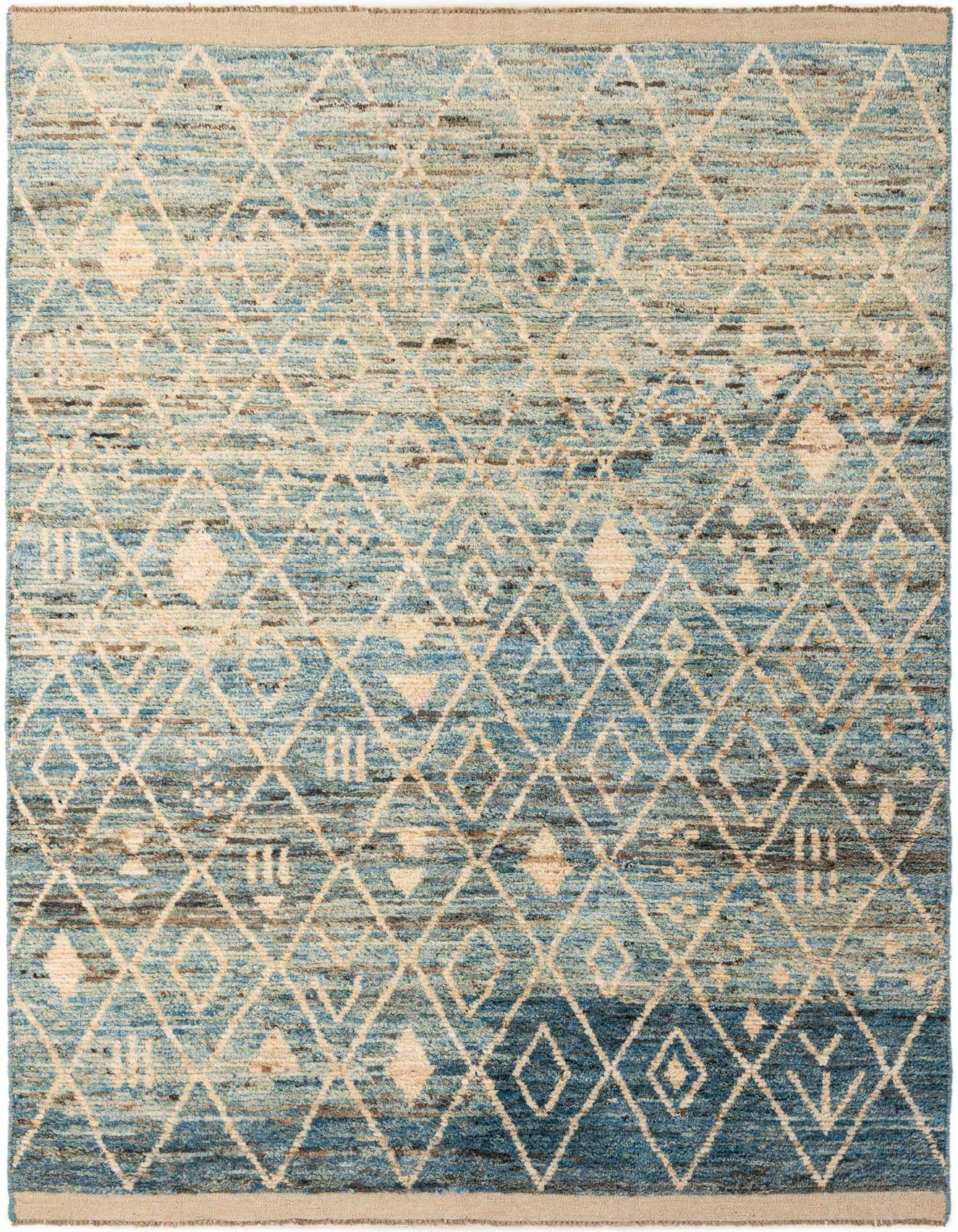 A 6x9 rectangular Moroccan tribal rug in varying shades of blue with an off-white diamond pattern, ideal for a living room.