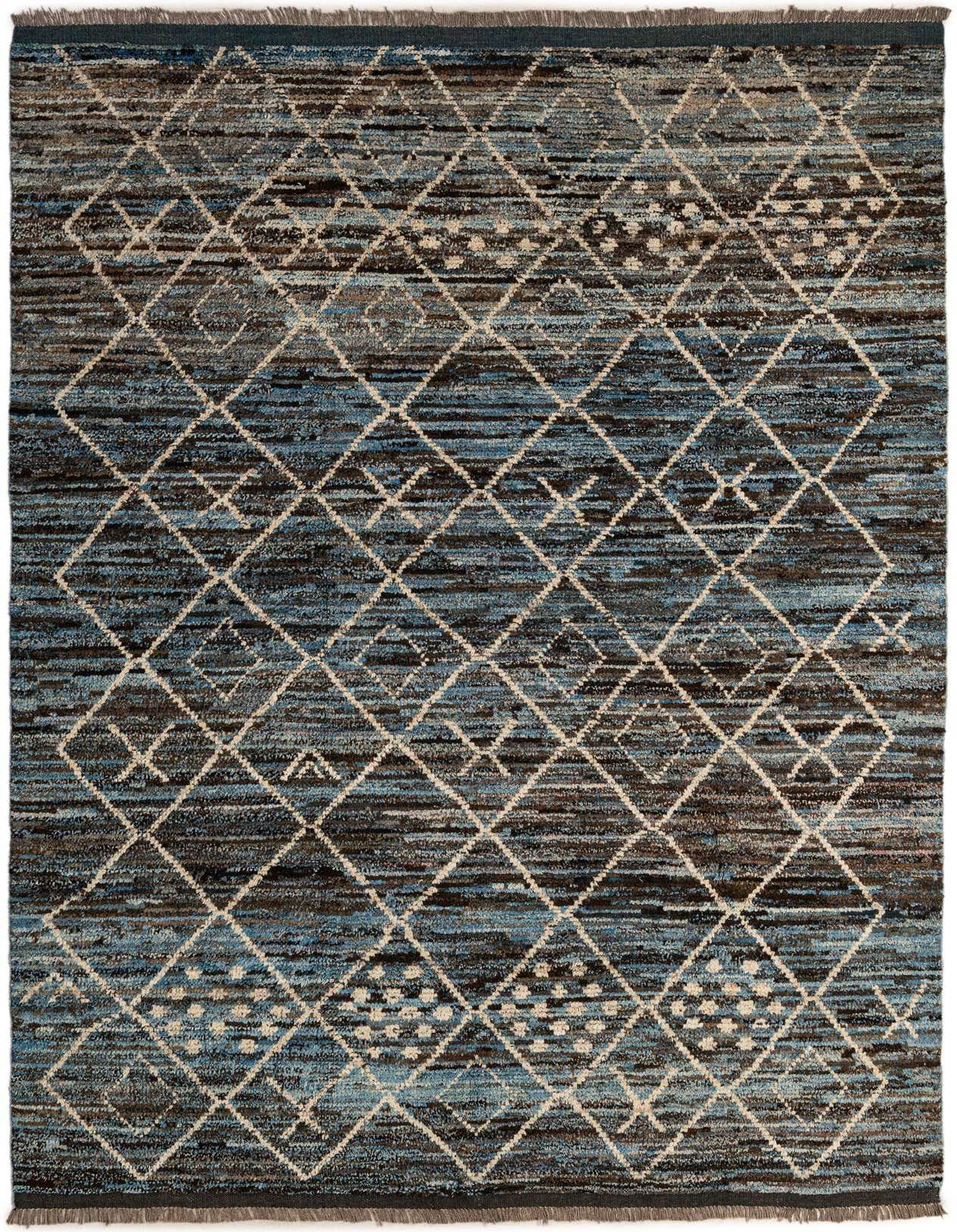 A 6x9 rectangular Moroccan tribal rug in varying shades of blue and brown with a cream diamond pattern.