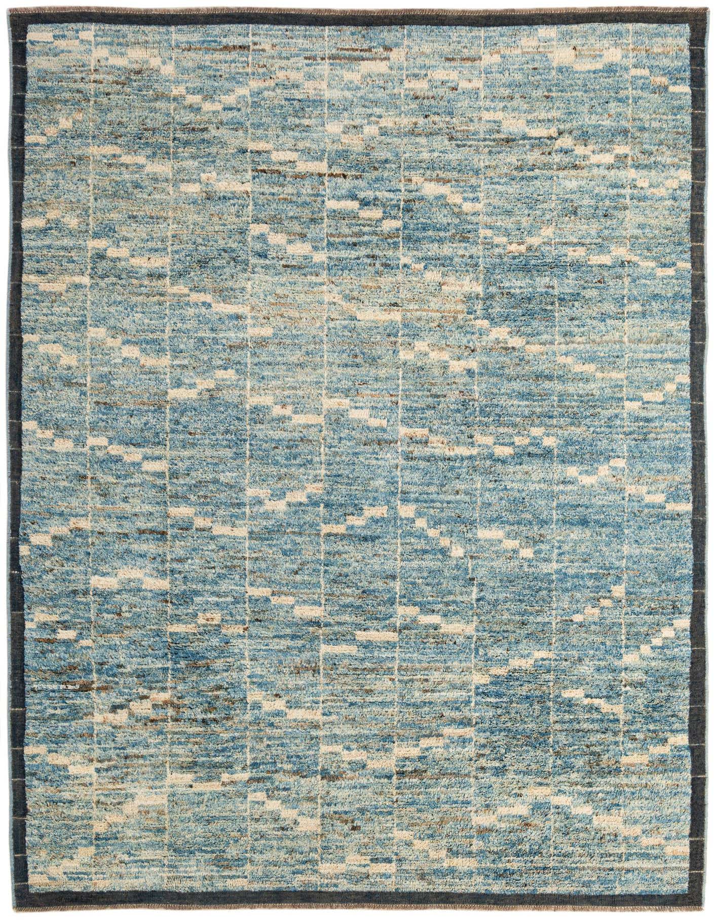 A 6x9 rectangular Moroccan tribal rug in varying shades of blue and cream, featuring a modern geometric pattern and a dark border.