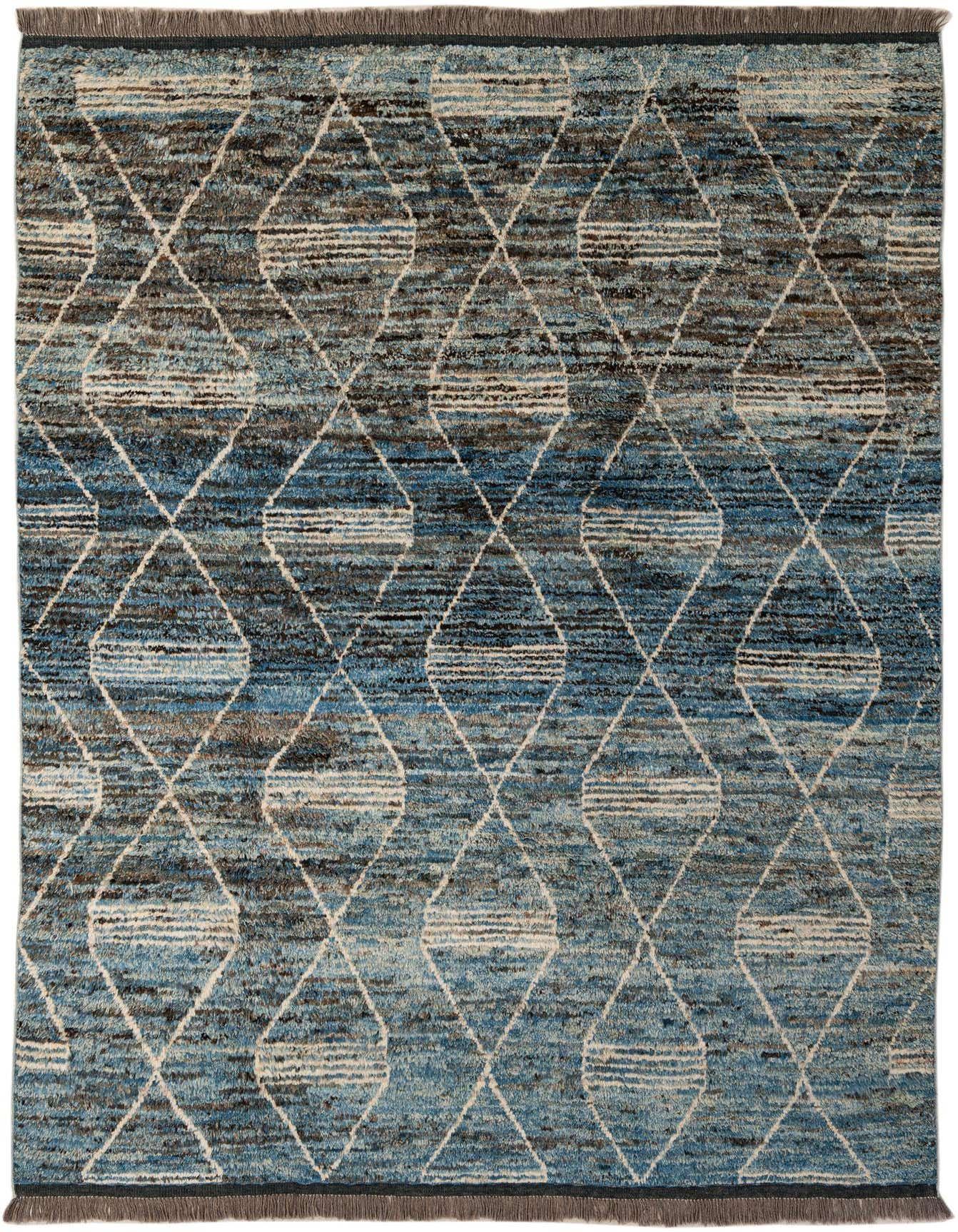 A 6x9 rectangular blue wool rug with a modern tribal diamond pattern and fringe, suitable for a living room.