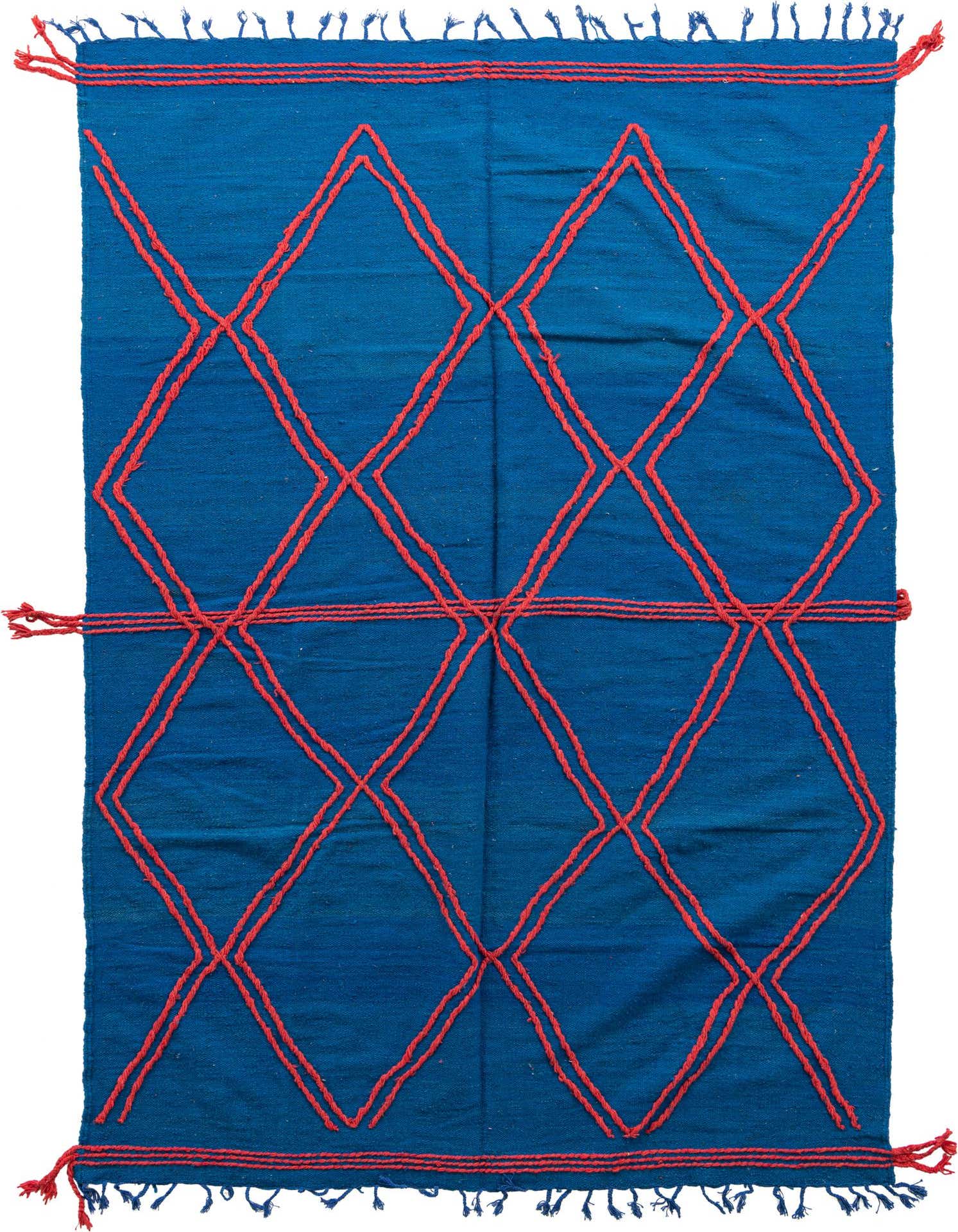 A 6x9 rectangular blue shag rug with a bold red tribal diamond pattern, ideal for a living room.