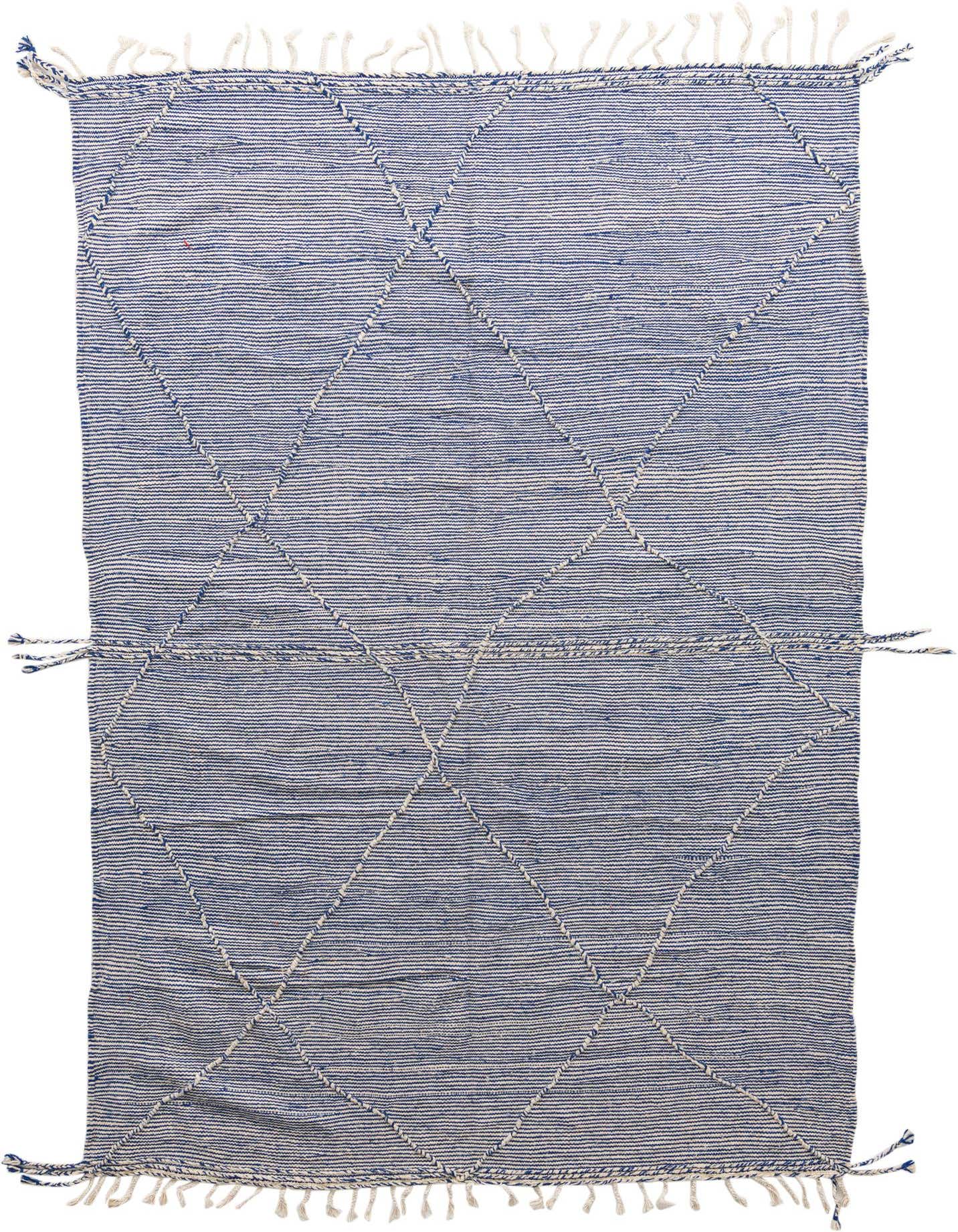 A 6x9 rectangular blue and white tribal shag rug with a diamond pattern and fringe, perfect for a living room.