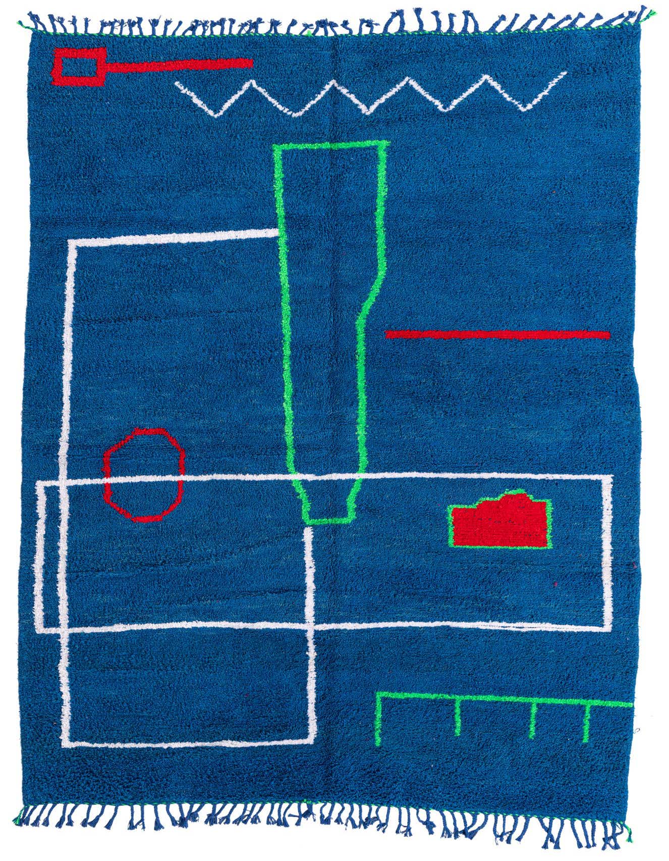 A 6x9 rectangular blue shag rug with a modern tribal abstract pattern in red, white, and green, suitable for a living room.