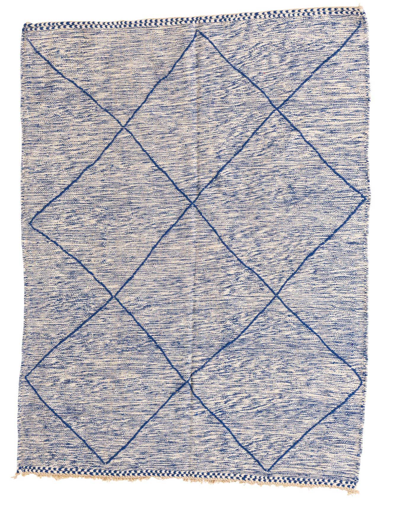 A 5x8 rectangular blue and off-white Moroccan shag rug with a tribal diamond pattern, handmade from wool.