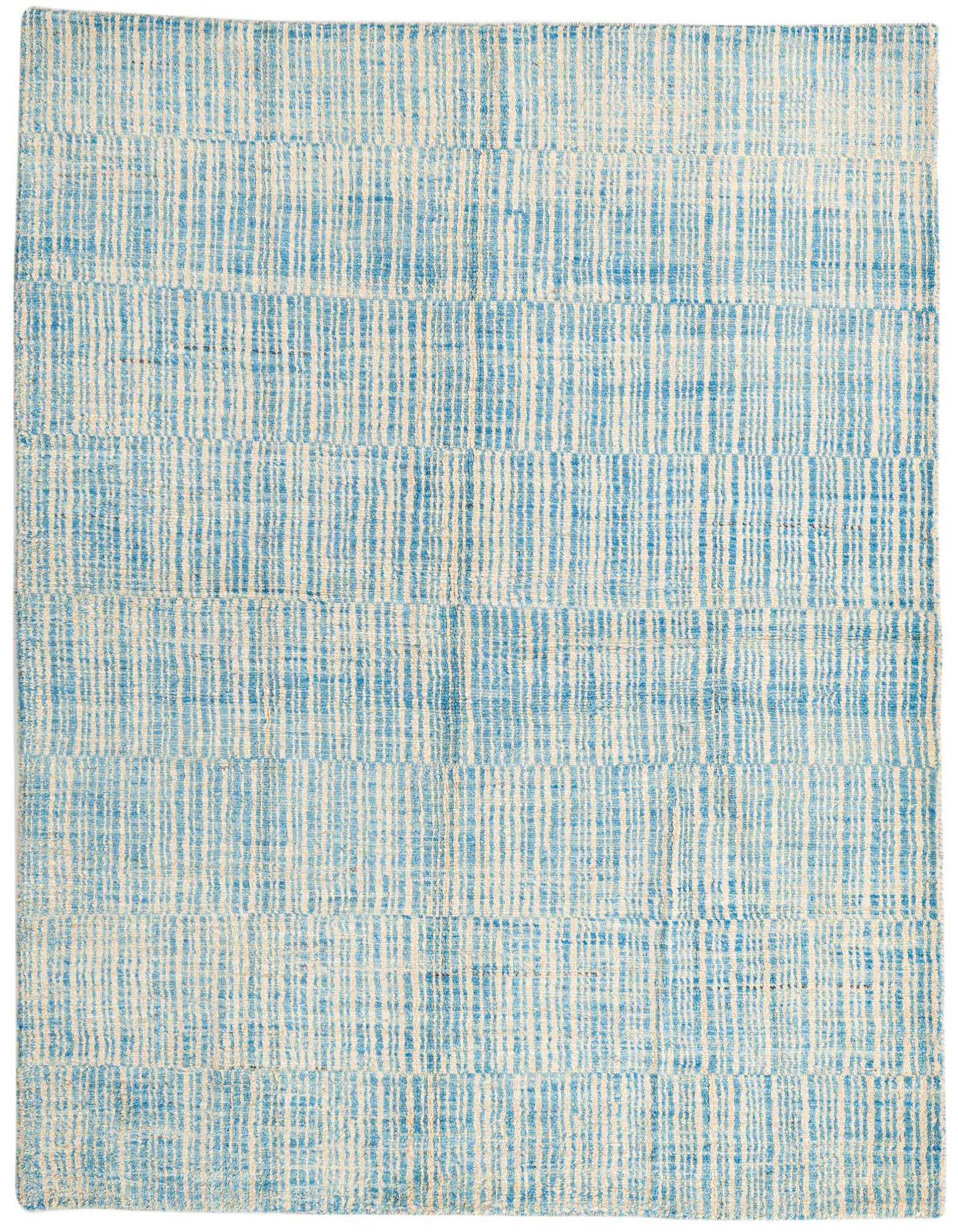 A 5x8 rectangular blue and off-white shag rug with a modern tribal stripe pattern, suitable for a living room.
